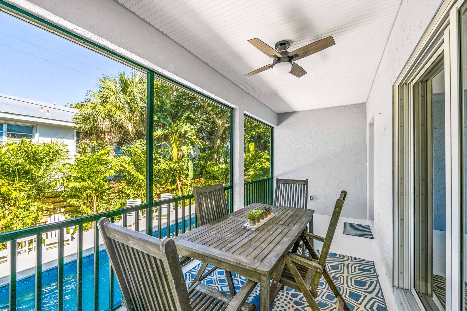 Screened Lanai with Dining for 4 - Overlooking Pool and Spa