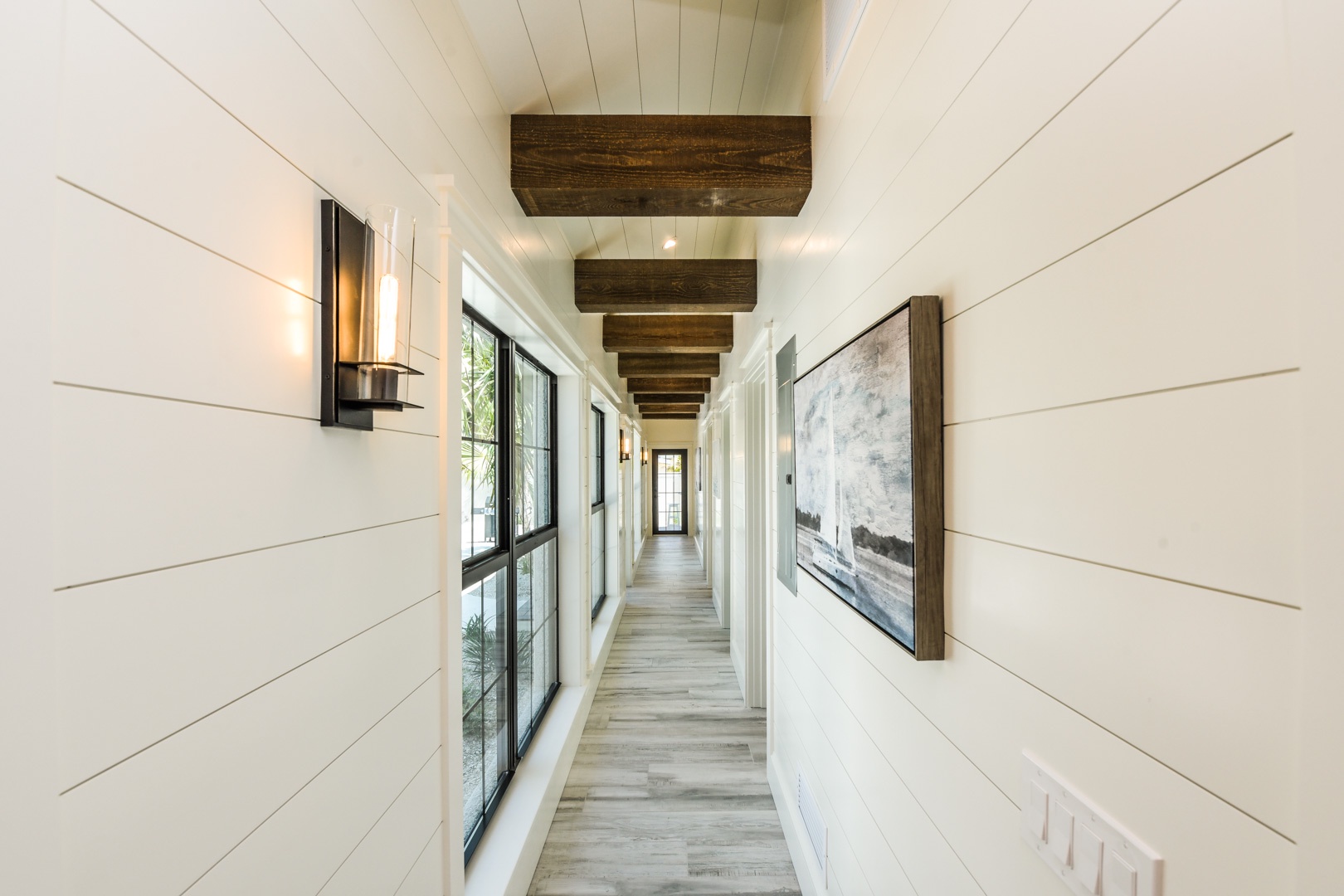 Hallway to bedrooms and  attached mother in law suite