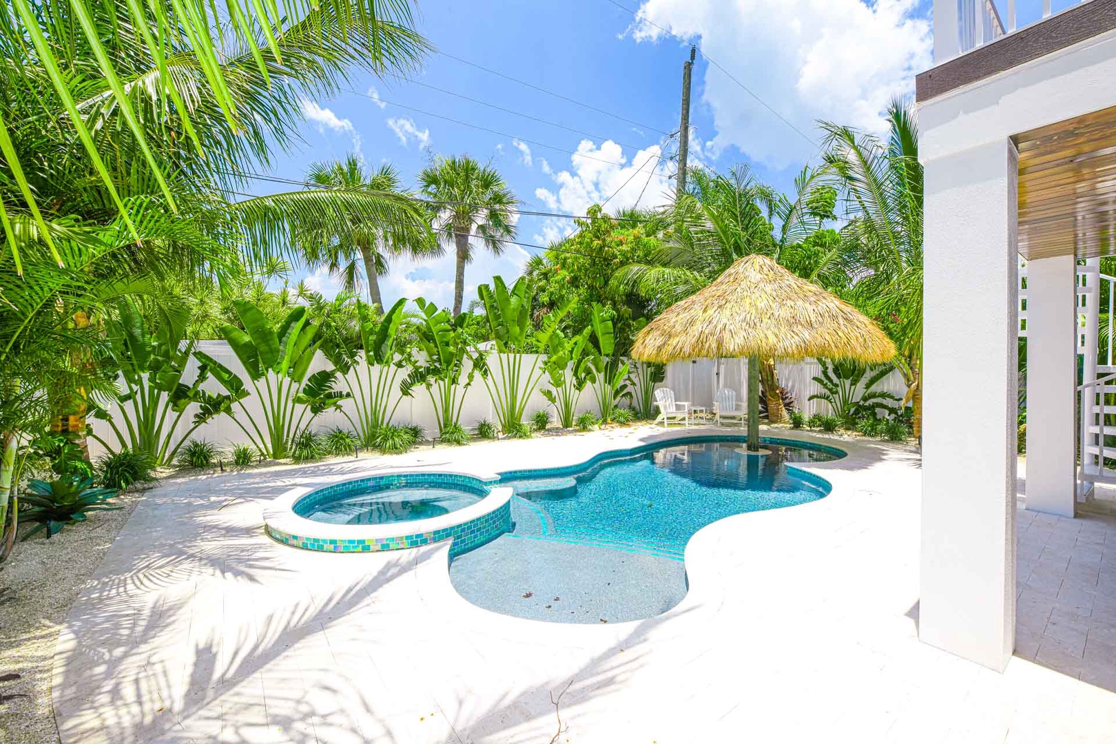 Pool & Spa with Large Tiki, Table, and Stools