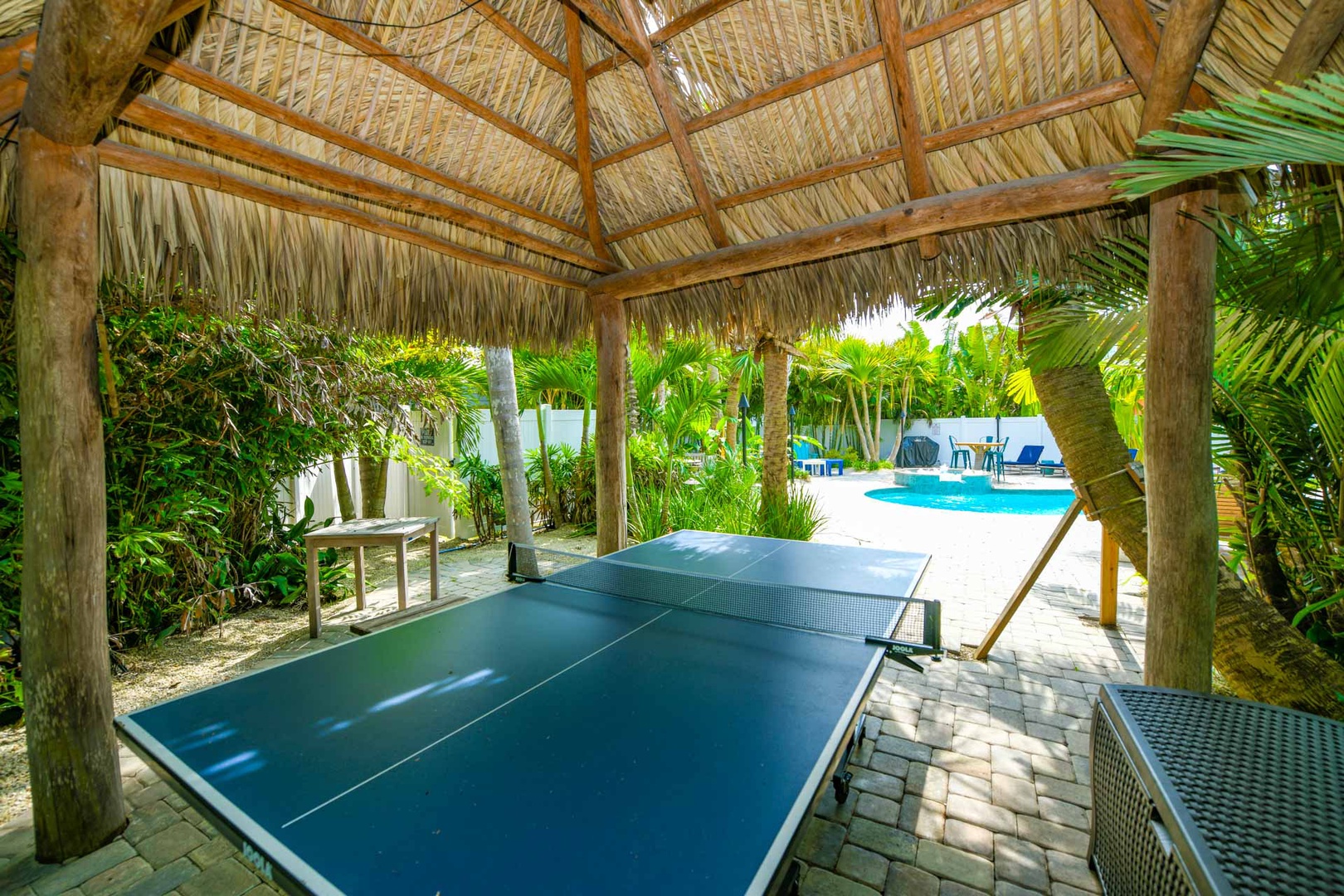 Ping Pong. Tiki Hut. Seating. Ring Game. Located off Pool