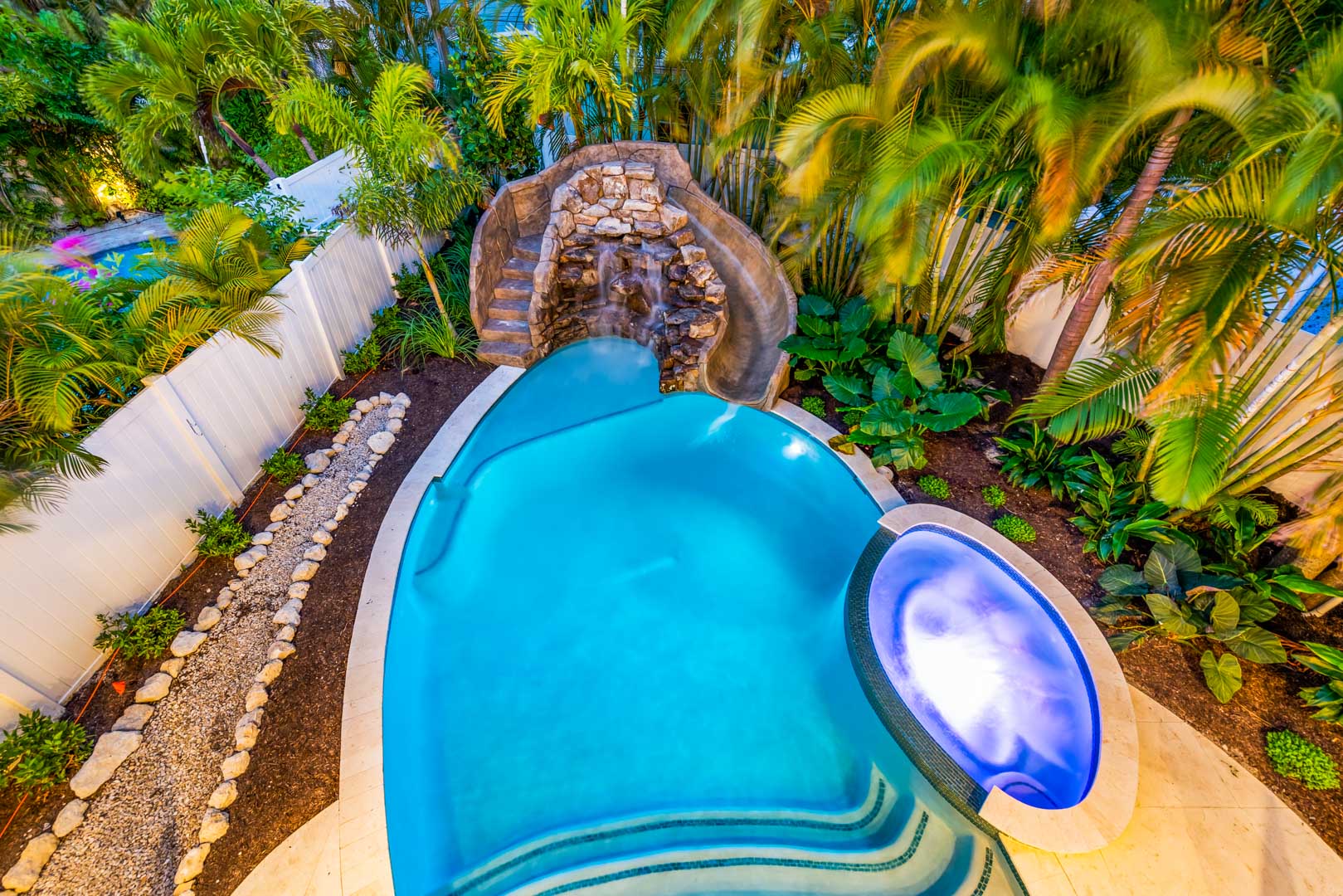 View from Balcony at Sunset - Pool and Spa with a Waterslide