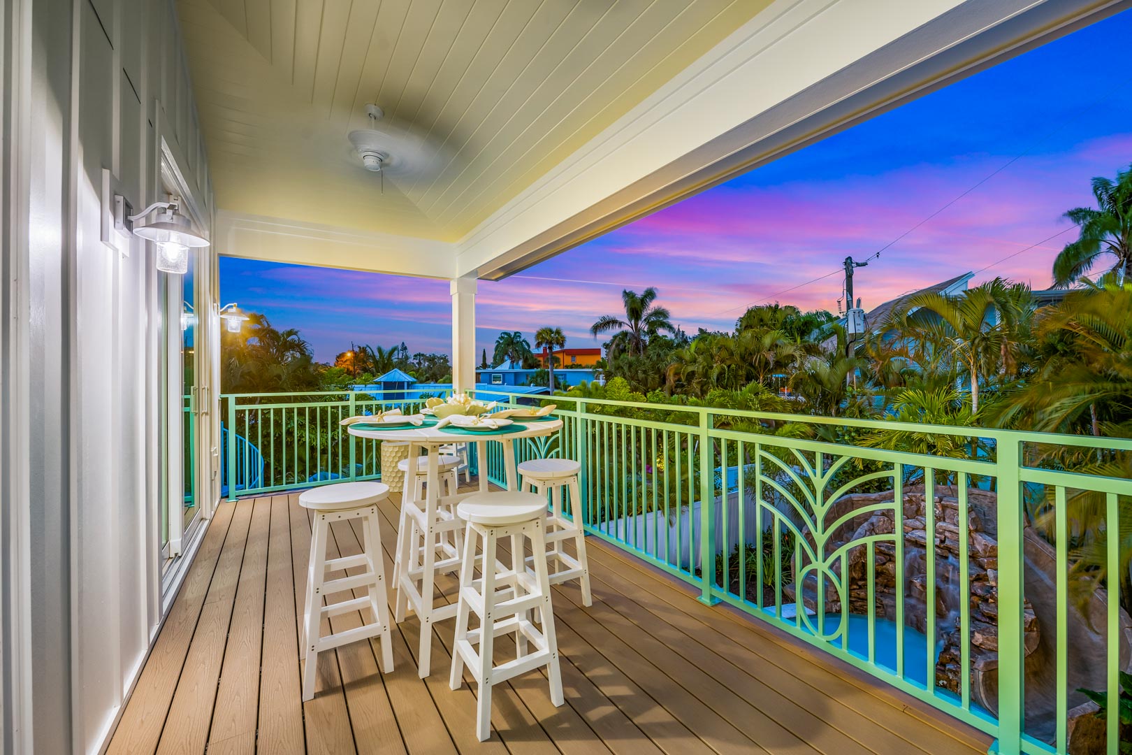 Balcony View of the Pool and Siesta Key Village at Sunset