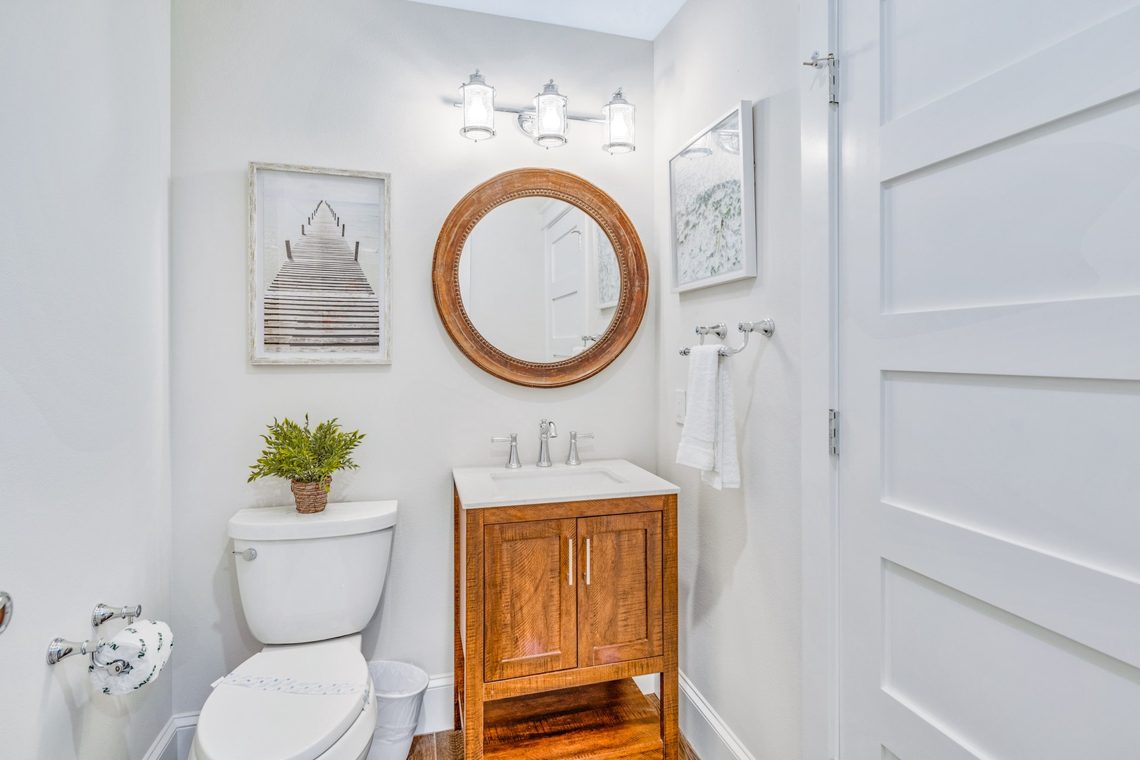 Half Bathroom off of Kitchen with Washer and Dryer