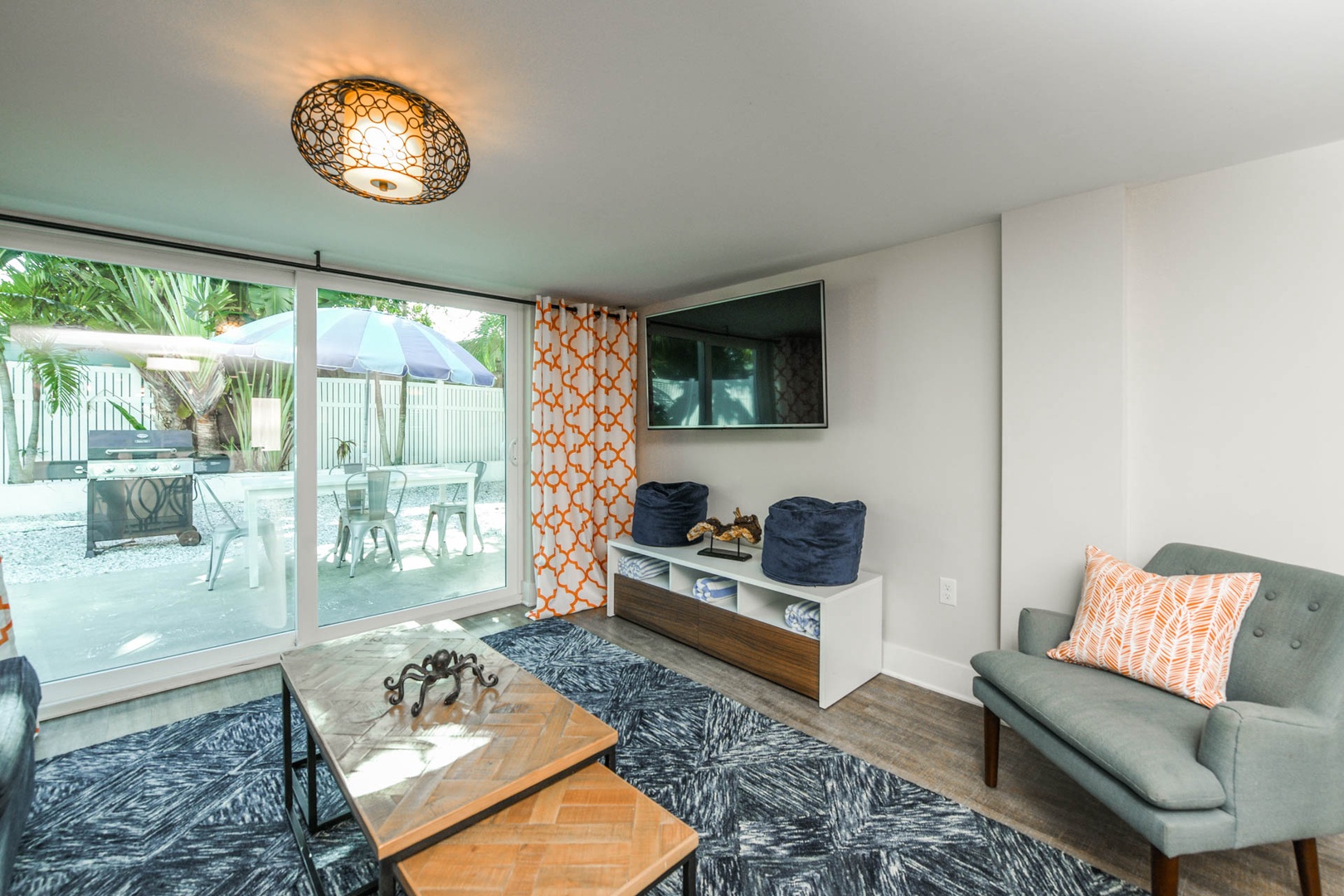 Living Room with Large Sliding Glass Door to Private Patio