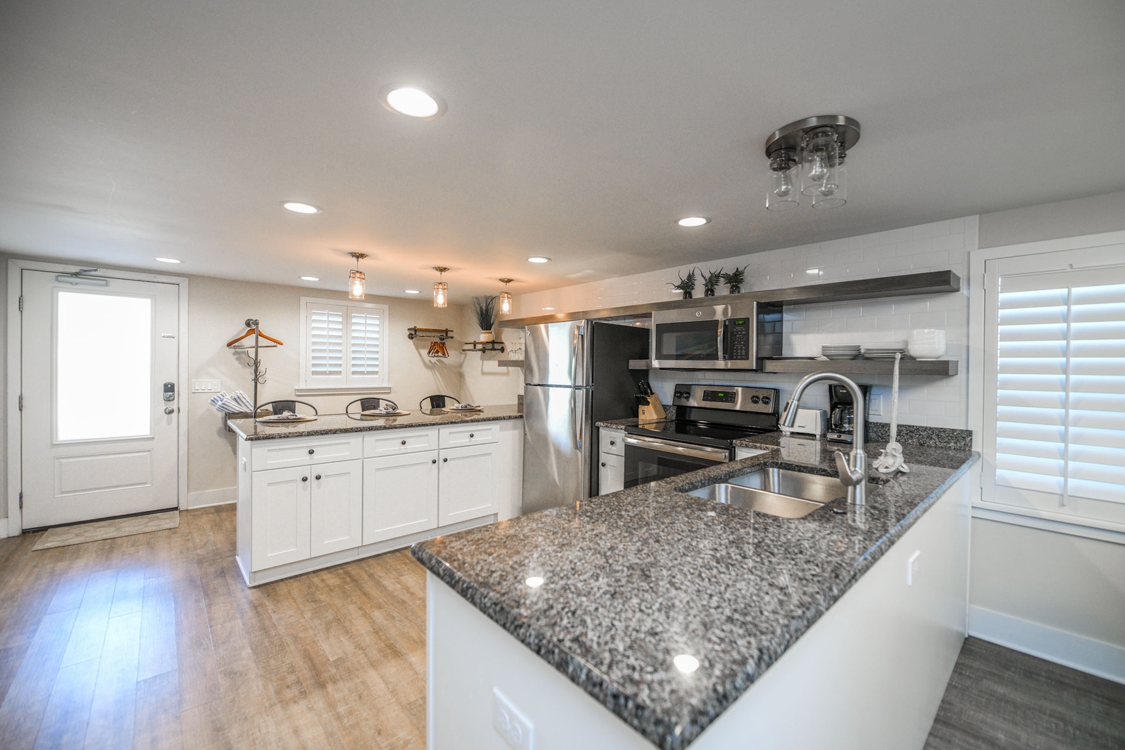 Entrance - Kitchen area and Bar Top Seating for 3