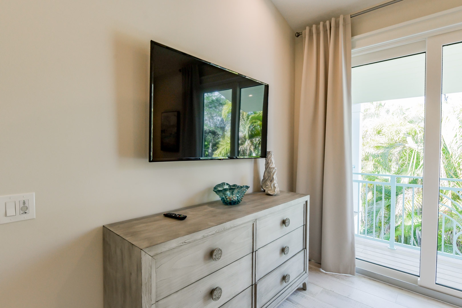 Flat screen tv in king bedroom