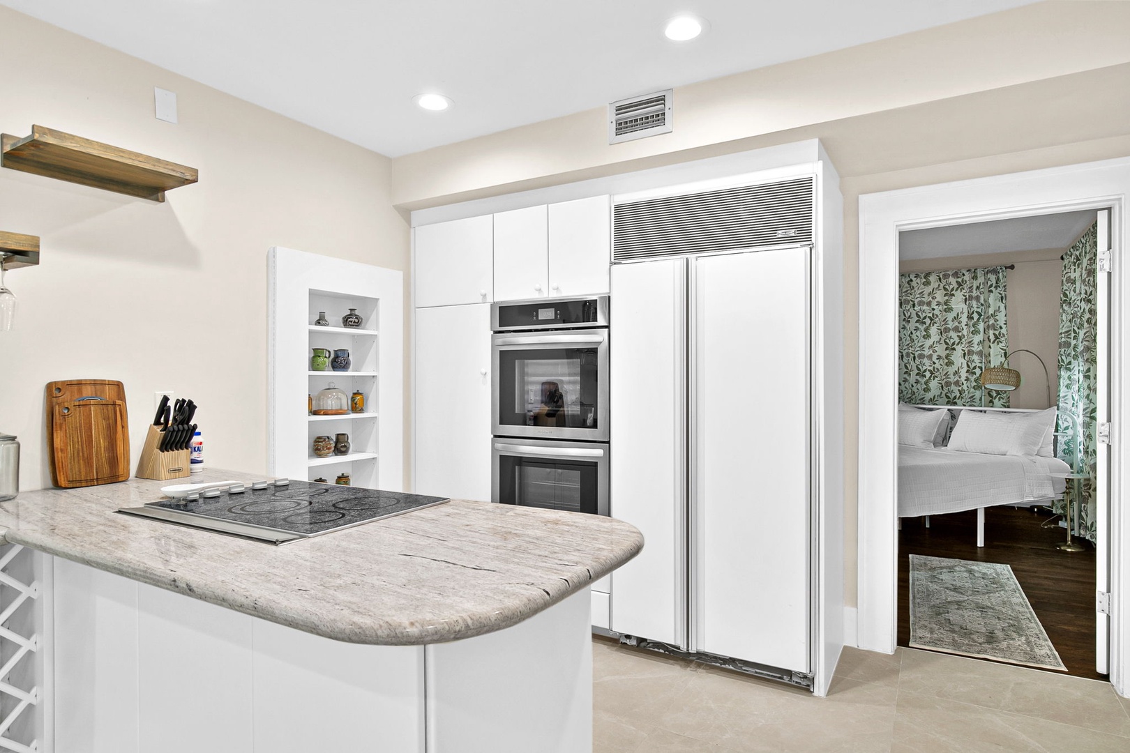Your gourmet kitchen awaits with granite countertops, stainless steel appliances, and everything you need to create memorable meals together.