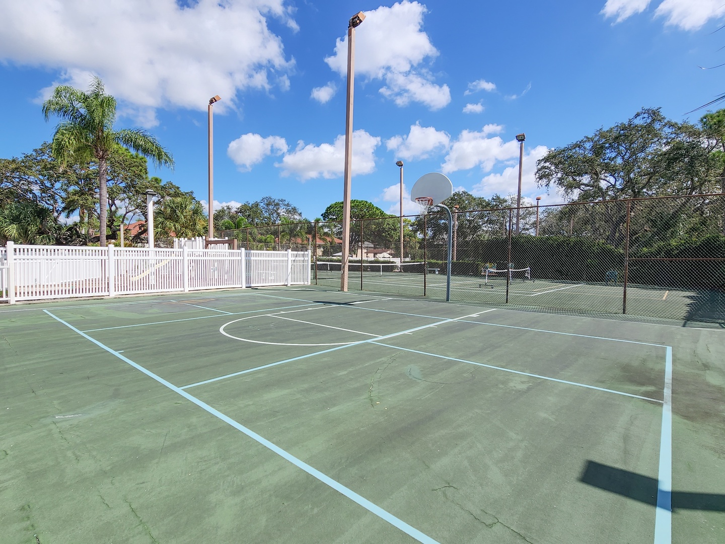 Step onto this multi-sport court where you can shoot hoops, play tennis, or challenge friends to your favorite game under sunny skies.