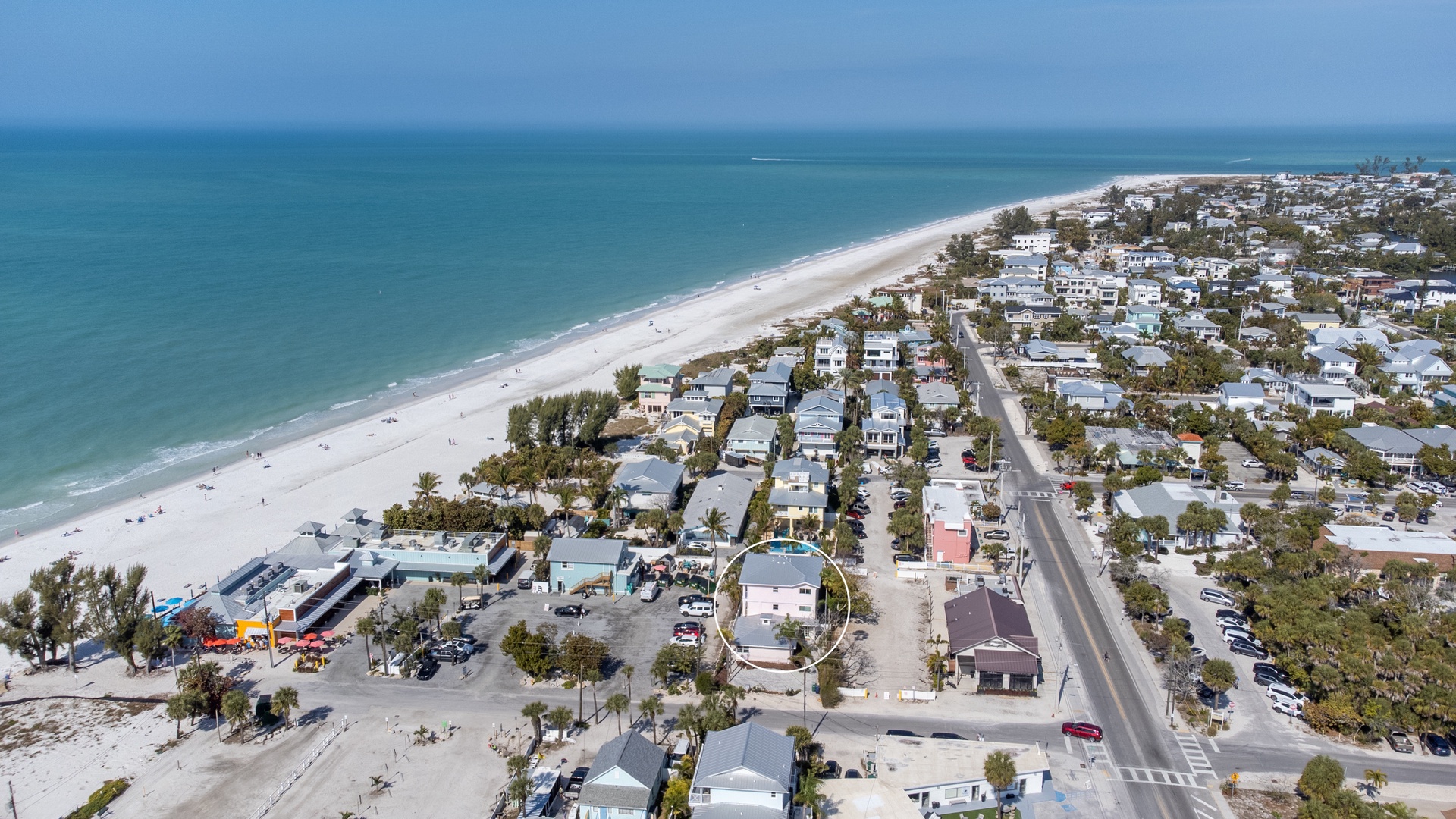 Pristine beachfront community with white sand beaches and turquoise waters stretching endlessly along the Gulf coast.