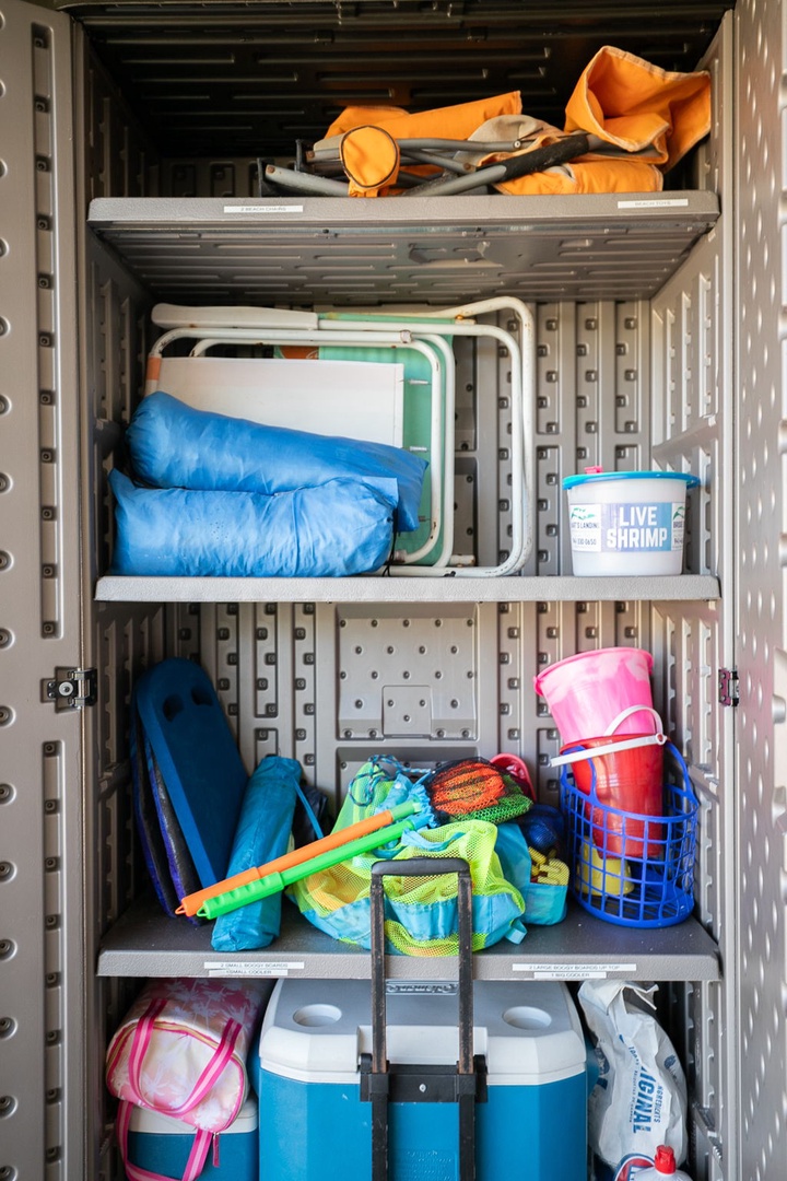 Your well-organized storage closet keeps beach gear and essentials perfectly arranged for your adventure-filled getaway.