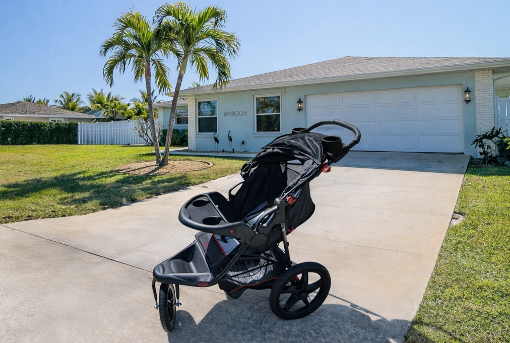 Family-friendly rental features baby essentials including baby stroller access for exploring the tropical neighborhood.