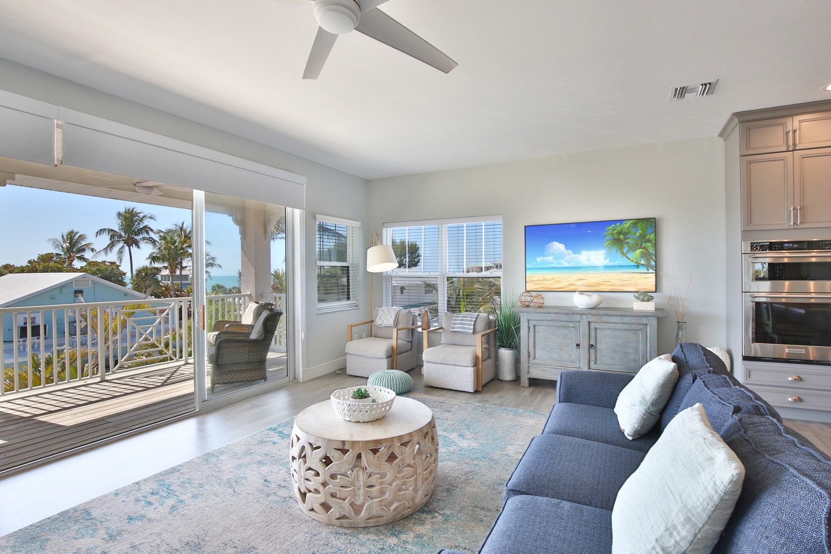 Relax in your bright living space with ocean views and tropical breezes from your private balcony.