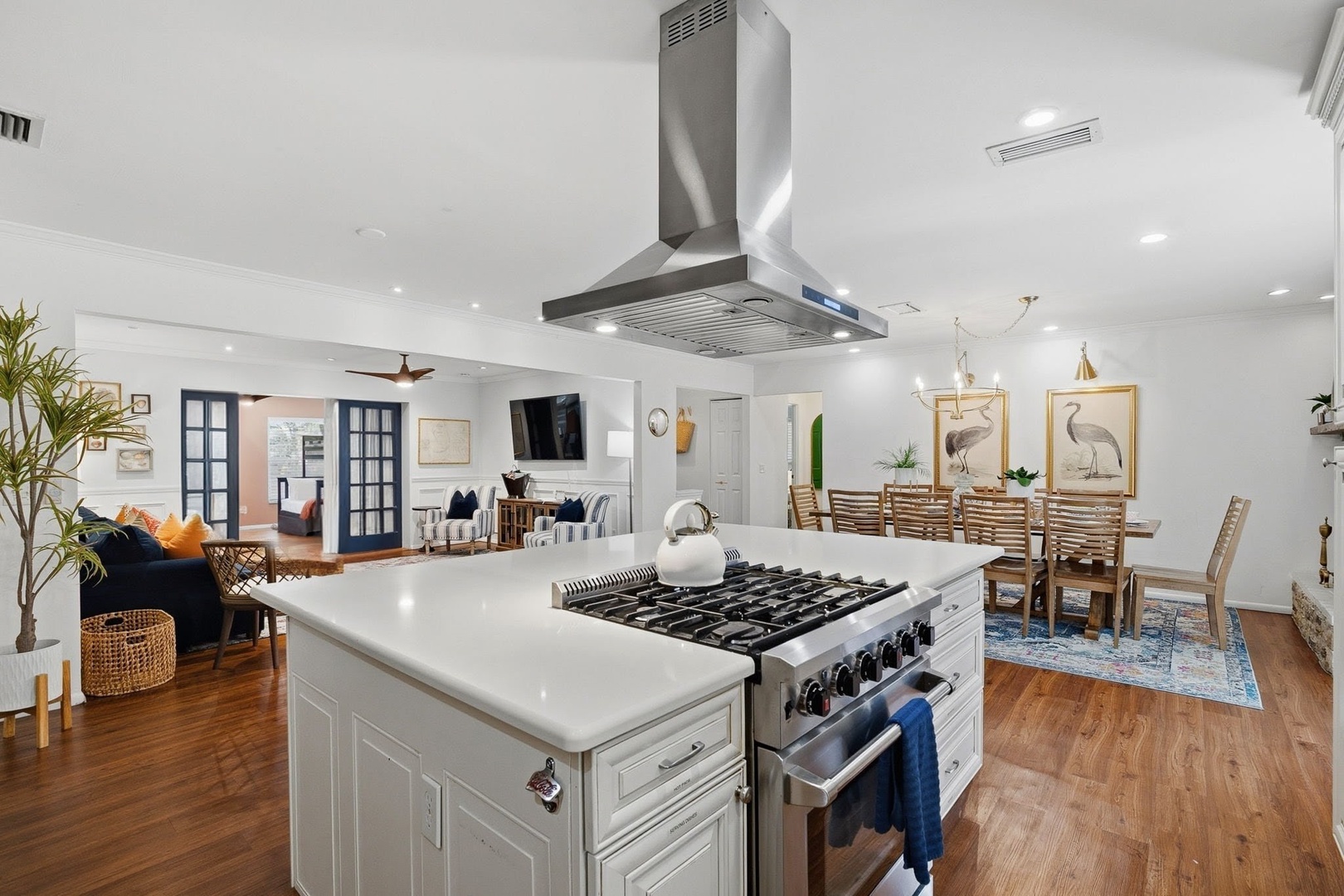 Your gourmet kitchen island becomes the heart of gathering, with professional appliances and open flow to living spaces.