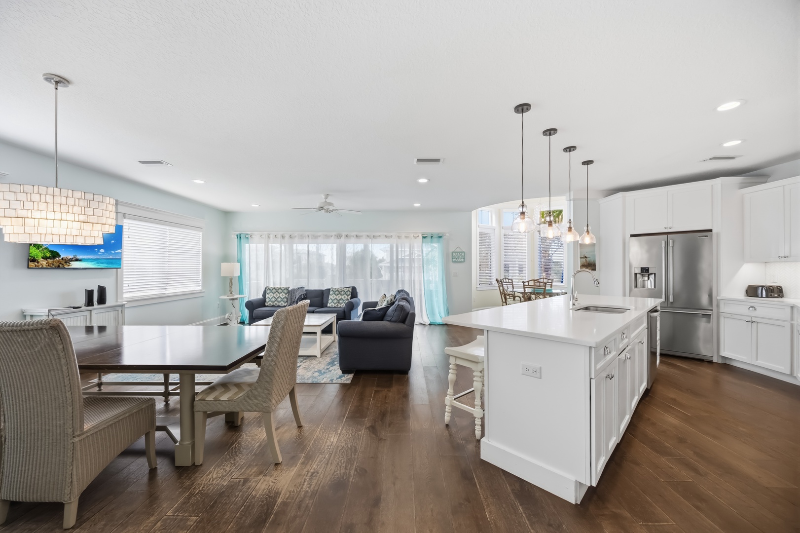 Enjoy this spacious open-concept layout where your kitchen, dining, and living areas flow seamlessly together for memorable gatherings.