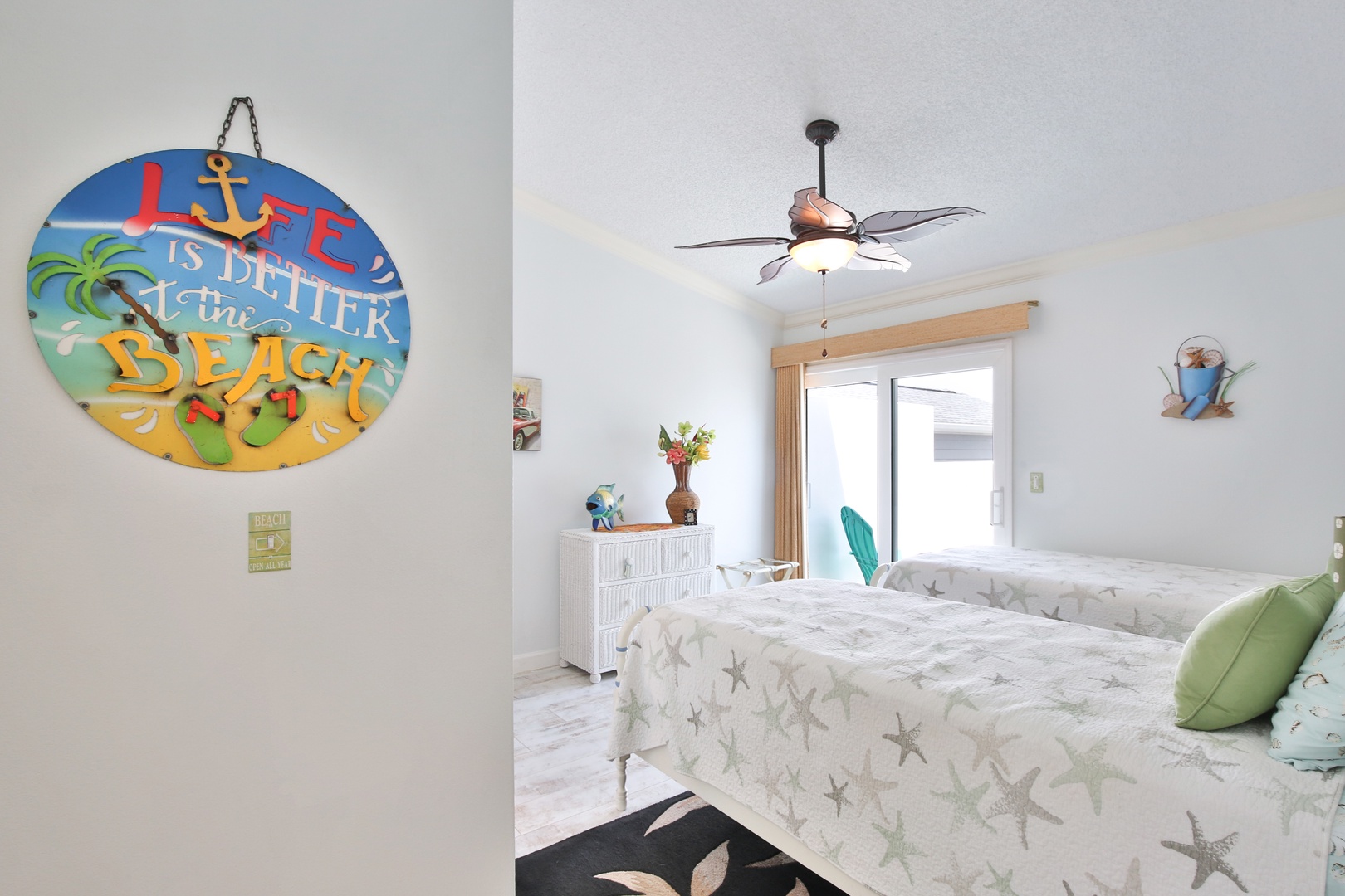 Wake up to beachy vibes in this coastal-themed bedroom, where starfish bedding and playful décor remind you that life really is better at the beach.