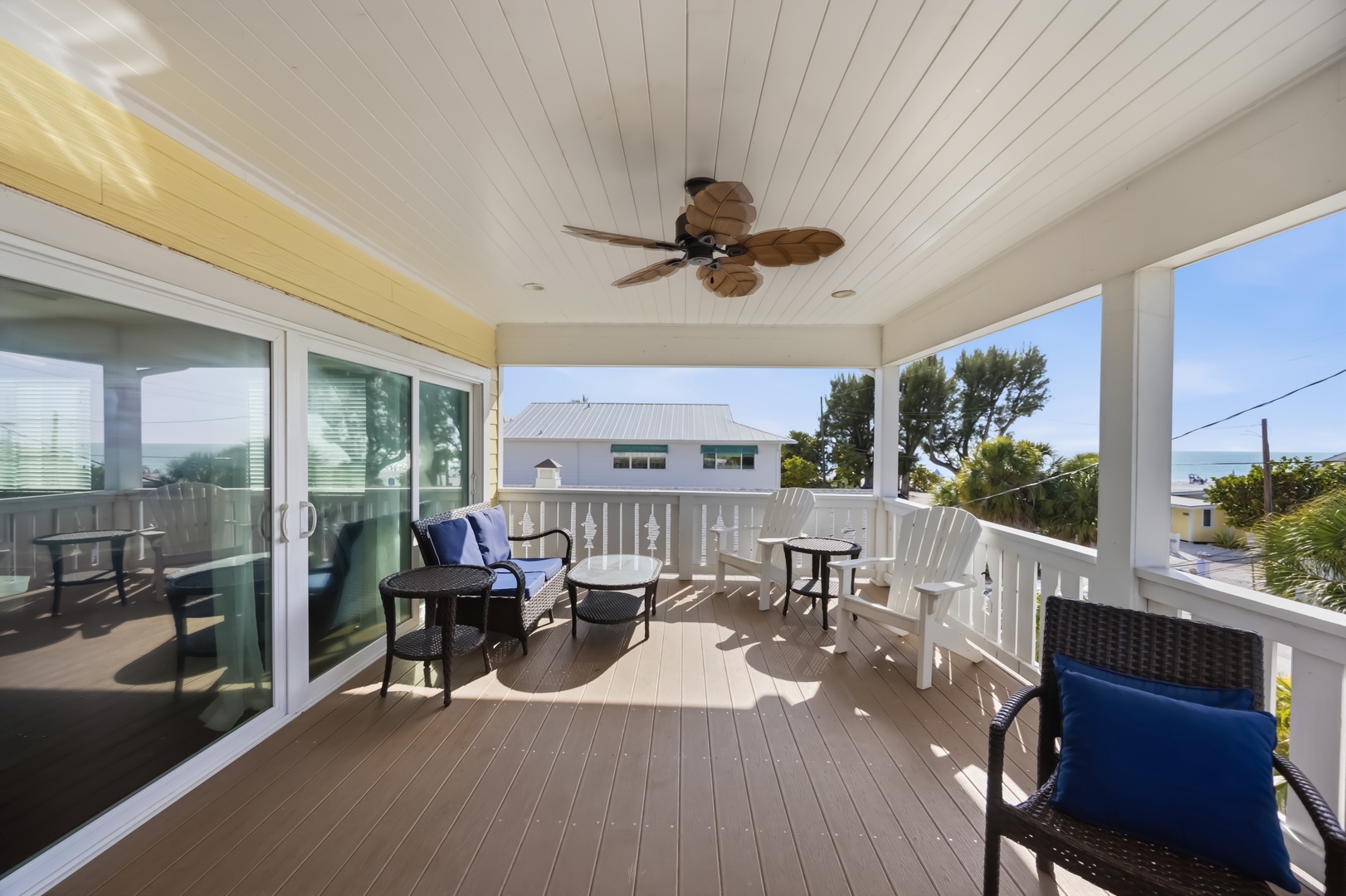 Your private covered deck offers comfortable seating and cooling ceiling fan breezes, perfect for morning coffee or evening relaxation.