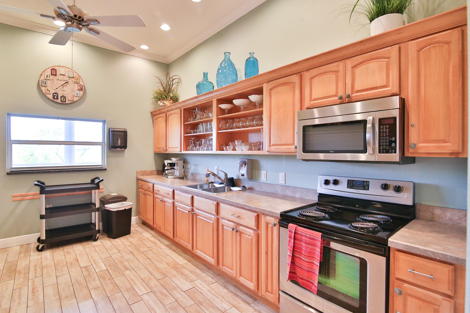 Your fully-equipped kitchen features warm wood cabinetry, stainless steel appliances, and plenty of counter space—perfect for preparing meals together with loved ones.