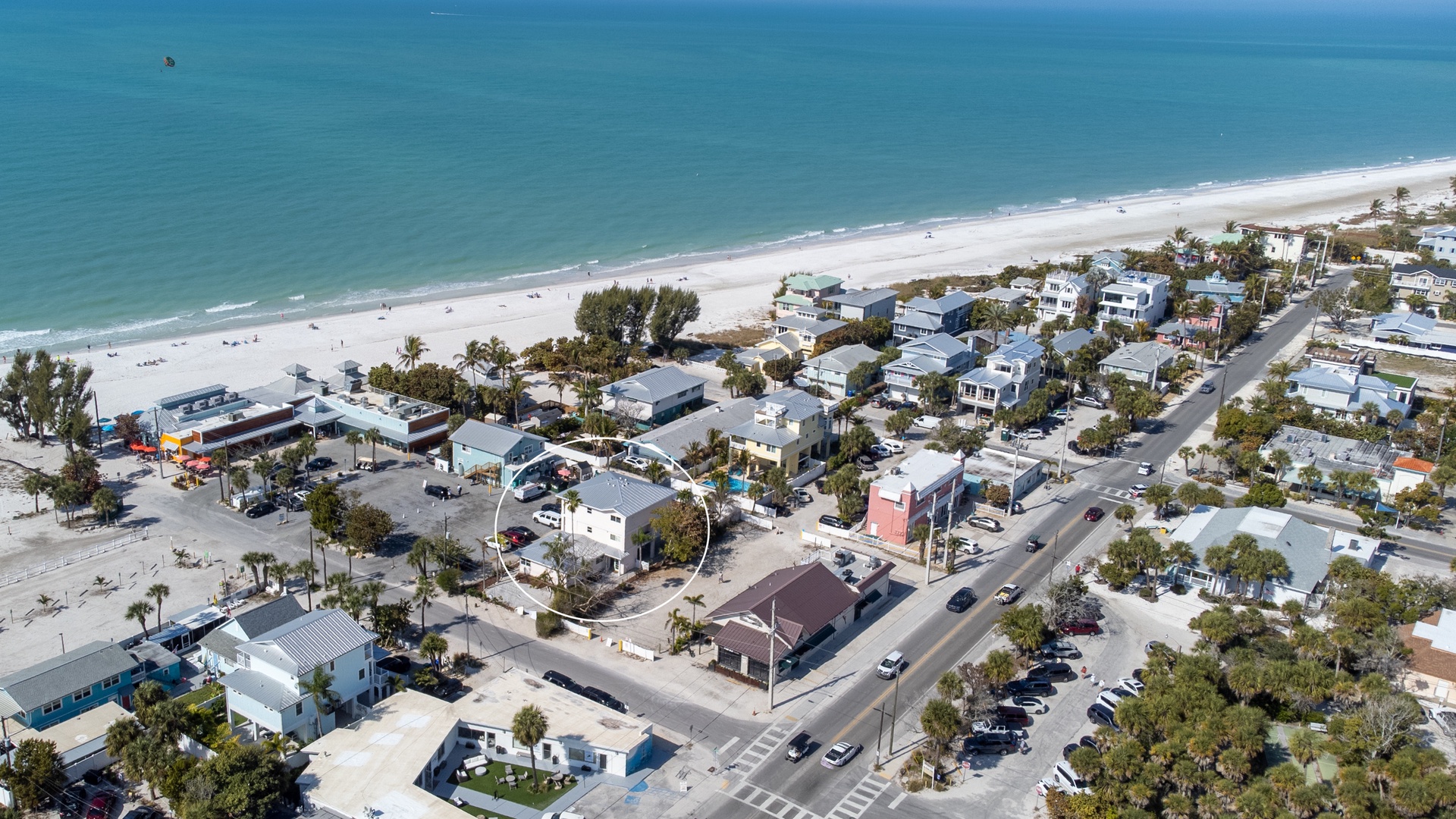 Coastal beach community with pristine white sand beaches and charming residential streets just steps from the ocean.