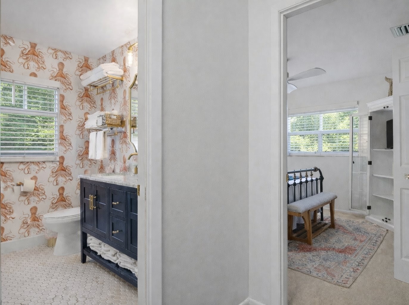 Your private suite features a whimsical powder room with playful octopus wallpaper and an elegant bedroom retreat with classic charm.