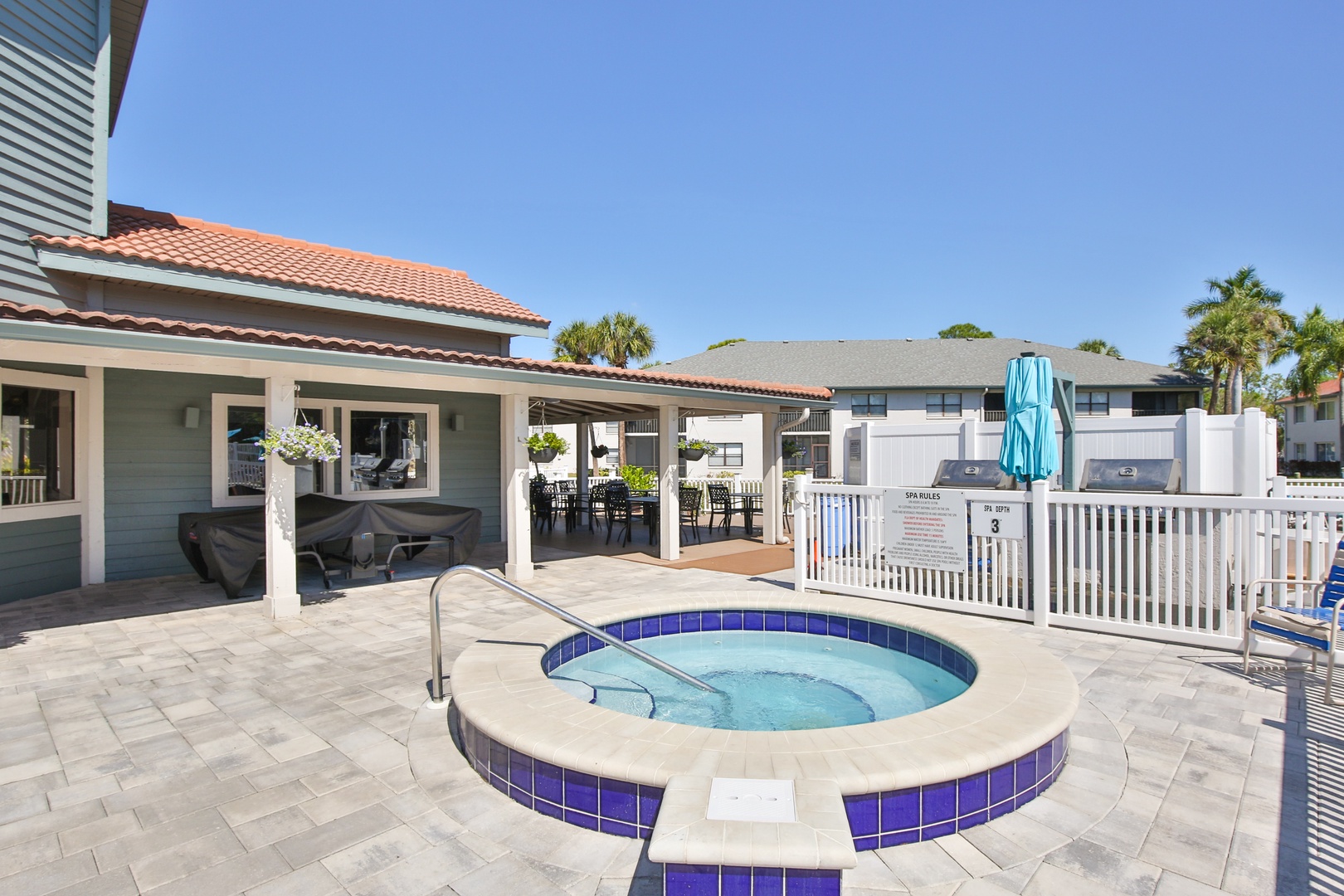 Soak in your private hot tub while enjoying the Florida sunshine from this stunning covered patio area.