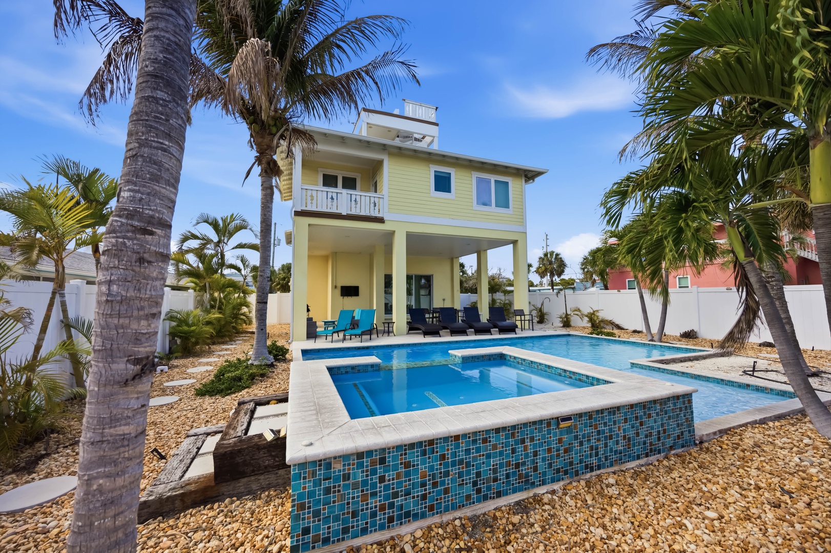 Tropical paradise awaits with your private pool surrounded by swaying palms and island charm.