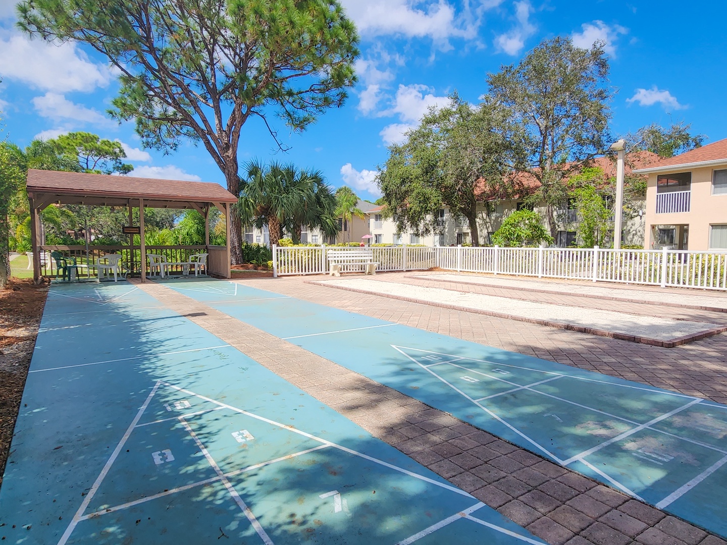 Challenge your friends to shuffleboard on this spacious outdoor court, surrounded by tropical palms and sunny Florida charm.