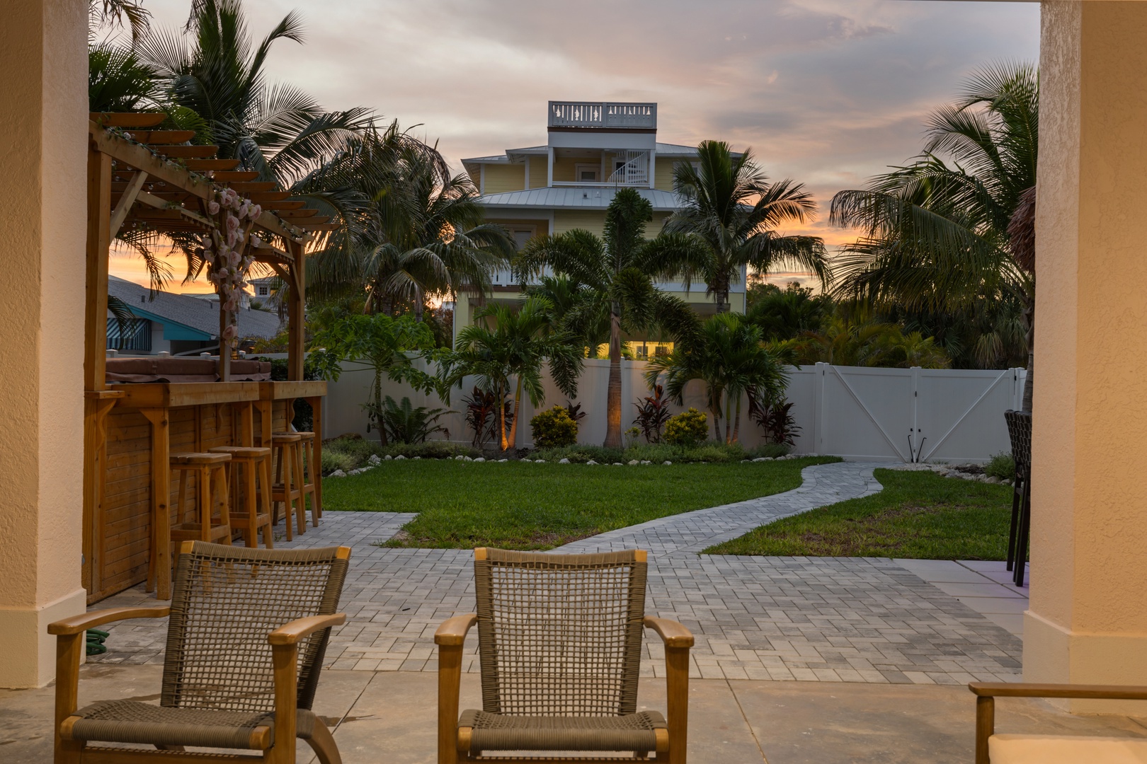 Relax on your private covered terrace as tropical breezes carry the scent of lush gardens through swaying palms.