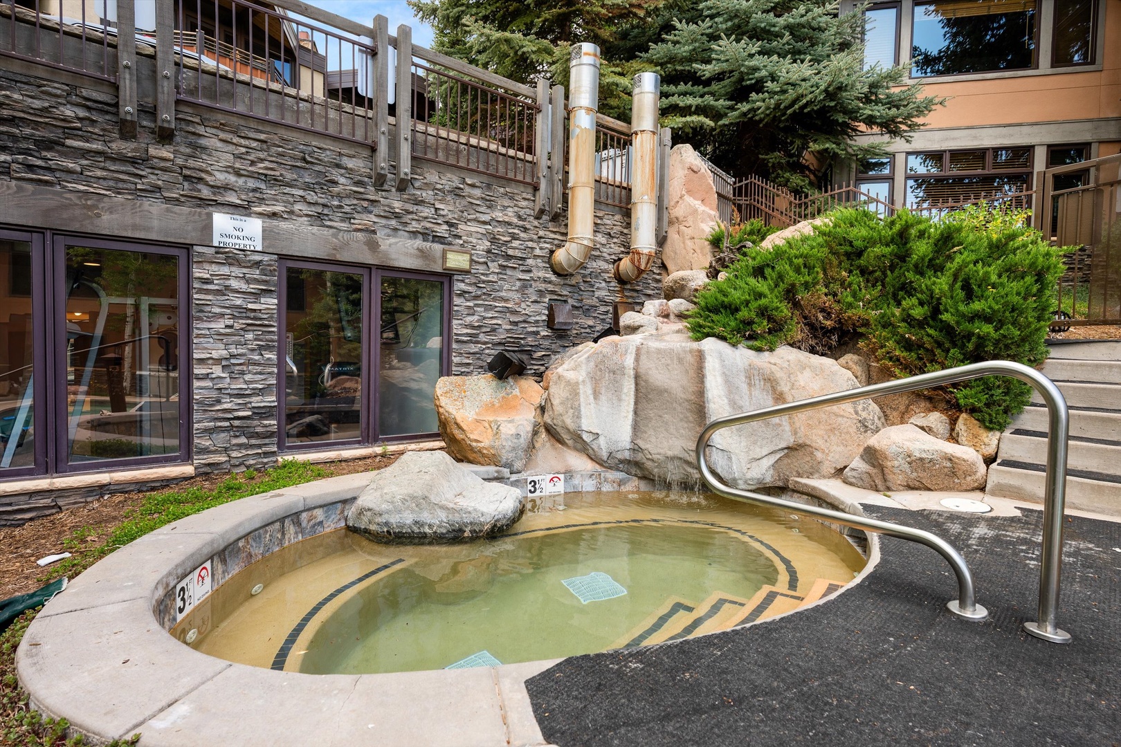 Soak in the mineral-rich hot springs with natural stone surroundings.
