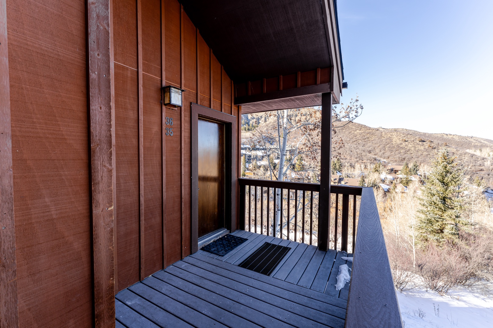 Shared entryway to complex with two condos. Your condo is up the stairs.