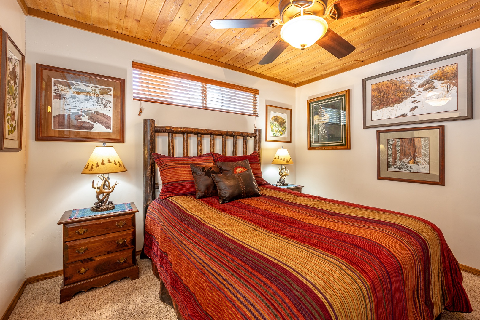Cozy up in your mountain retreat bedroom with rustic charm and warm southwestern-style bedding for peaceful nights.
