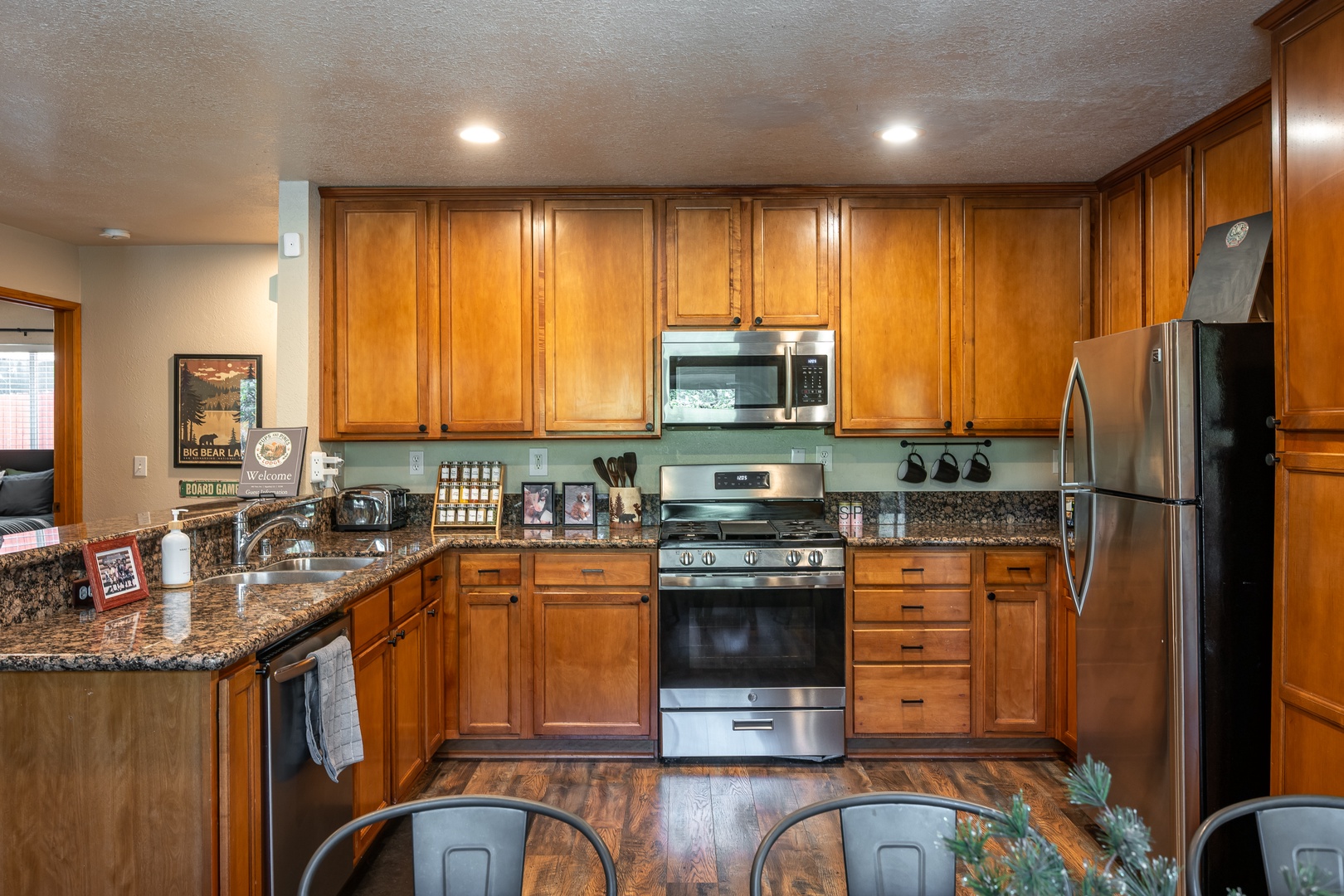Your fully equipped kitchen features granite countertops, stainless steel appliances, and plenty of space to prepare home-cooked meals during your stay.