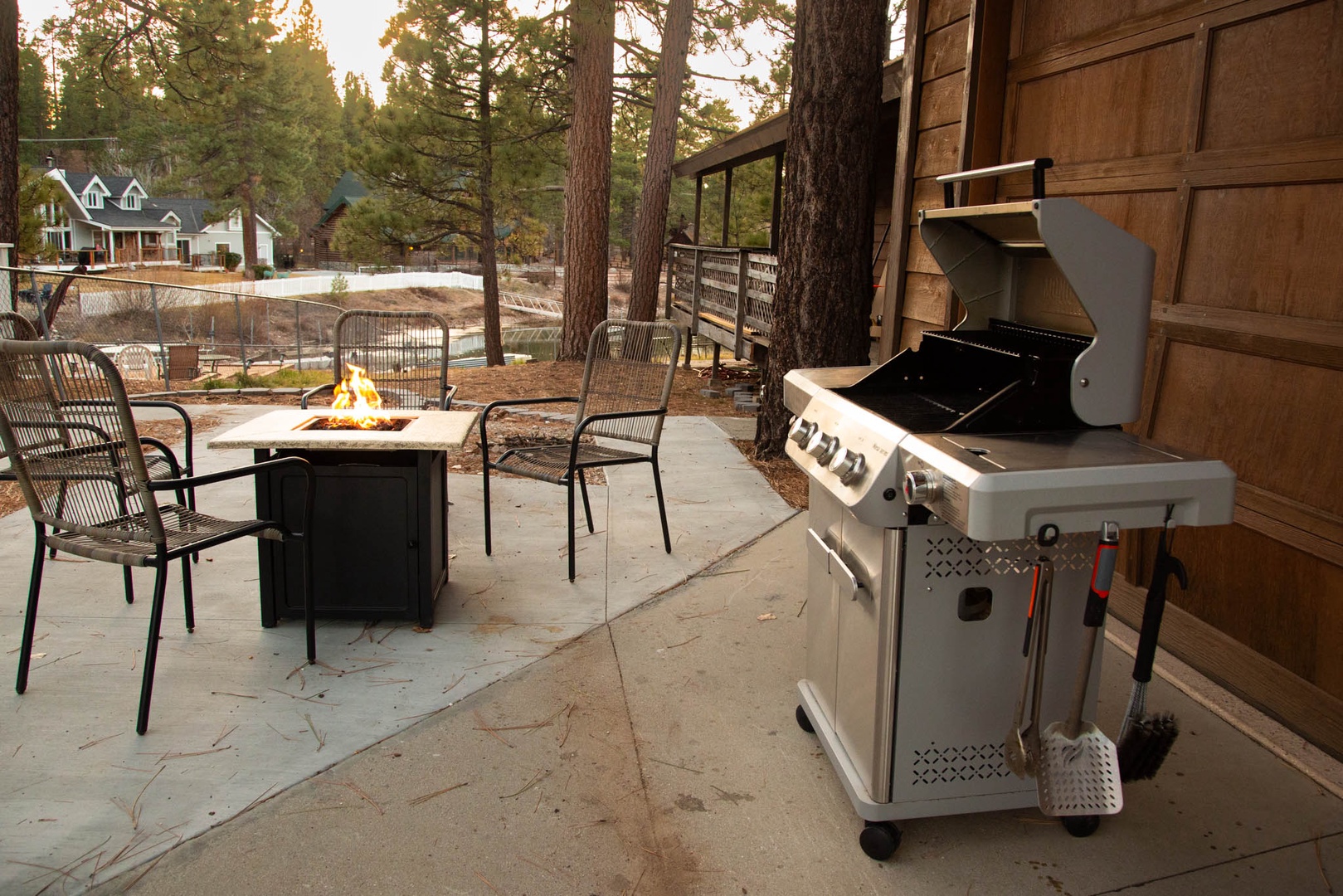 Throw dinner on the BBQ and dine by the fire pit looking out at the lake!