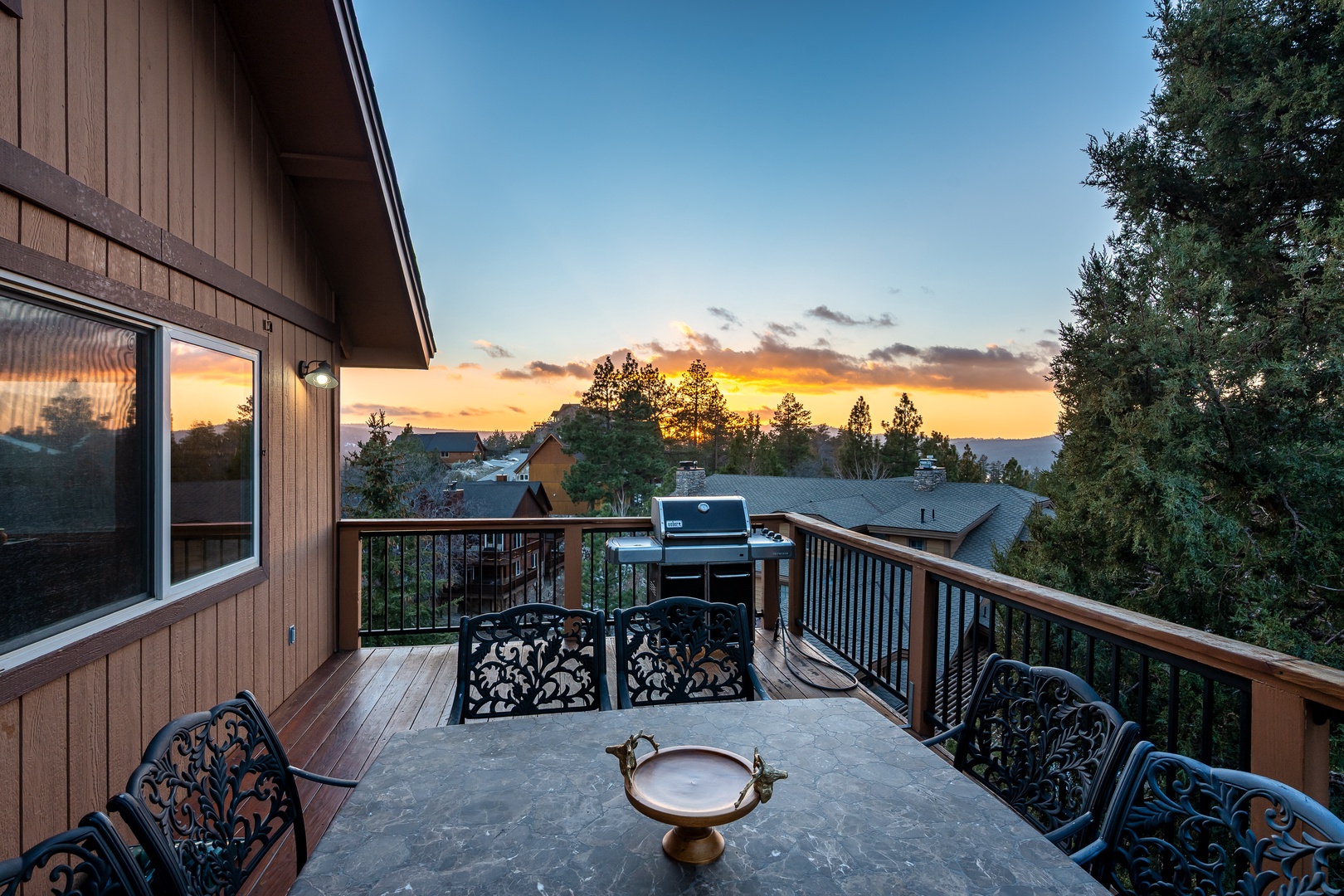 Your private deck offers stunning sunset views while you enjoy meals and evening barbecues surrounded by peaceful treetops.