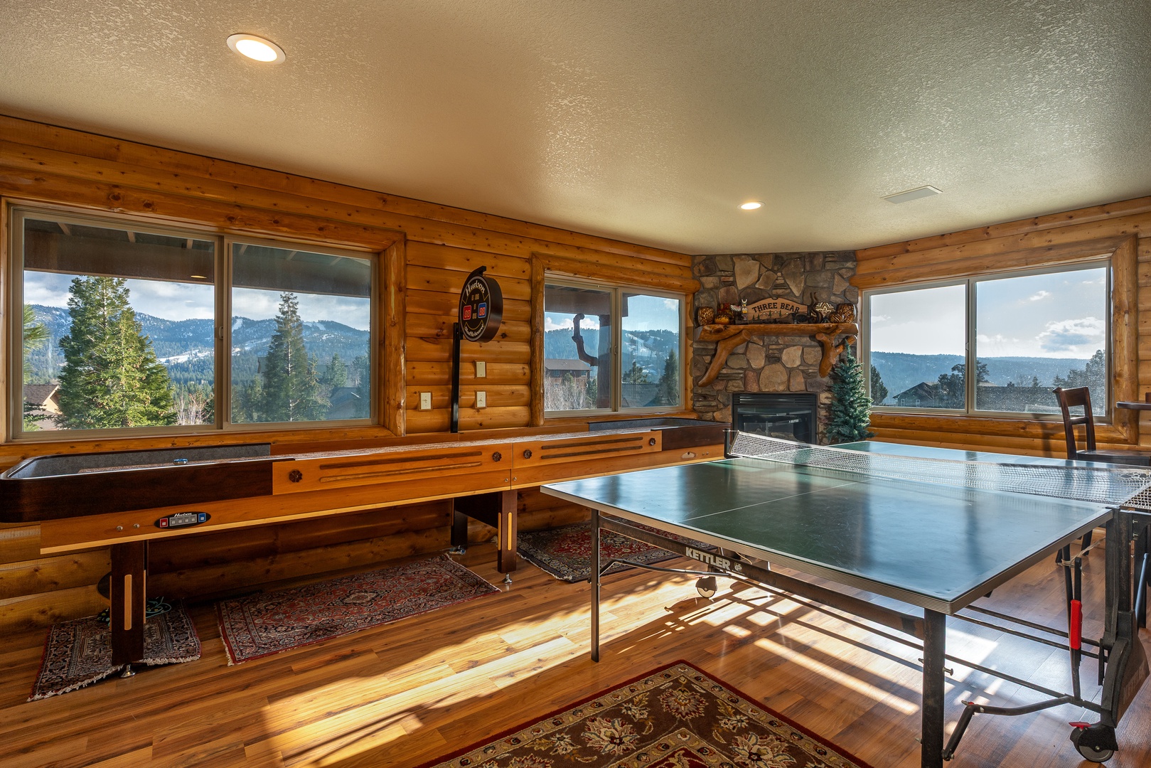 Challenge friends to ping pong while enjoying stunning mountain views in your spacious game room with cozy fireplace.