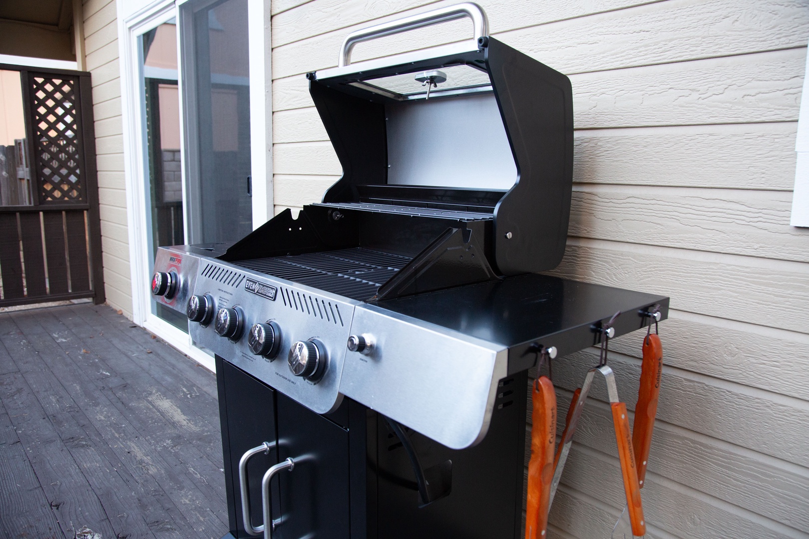 Fire up your culinary adventures with this new BBQ grill, featuring multiple burners and a convenient prep station!