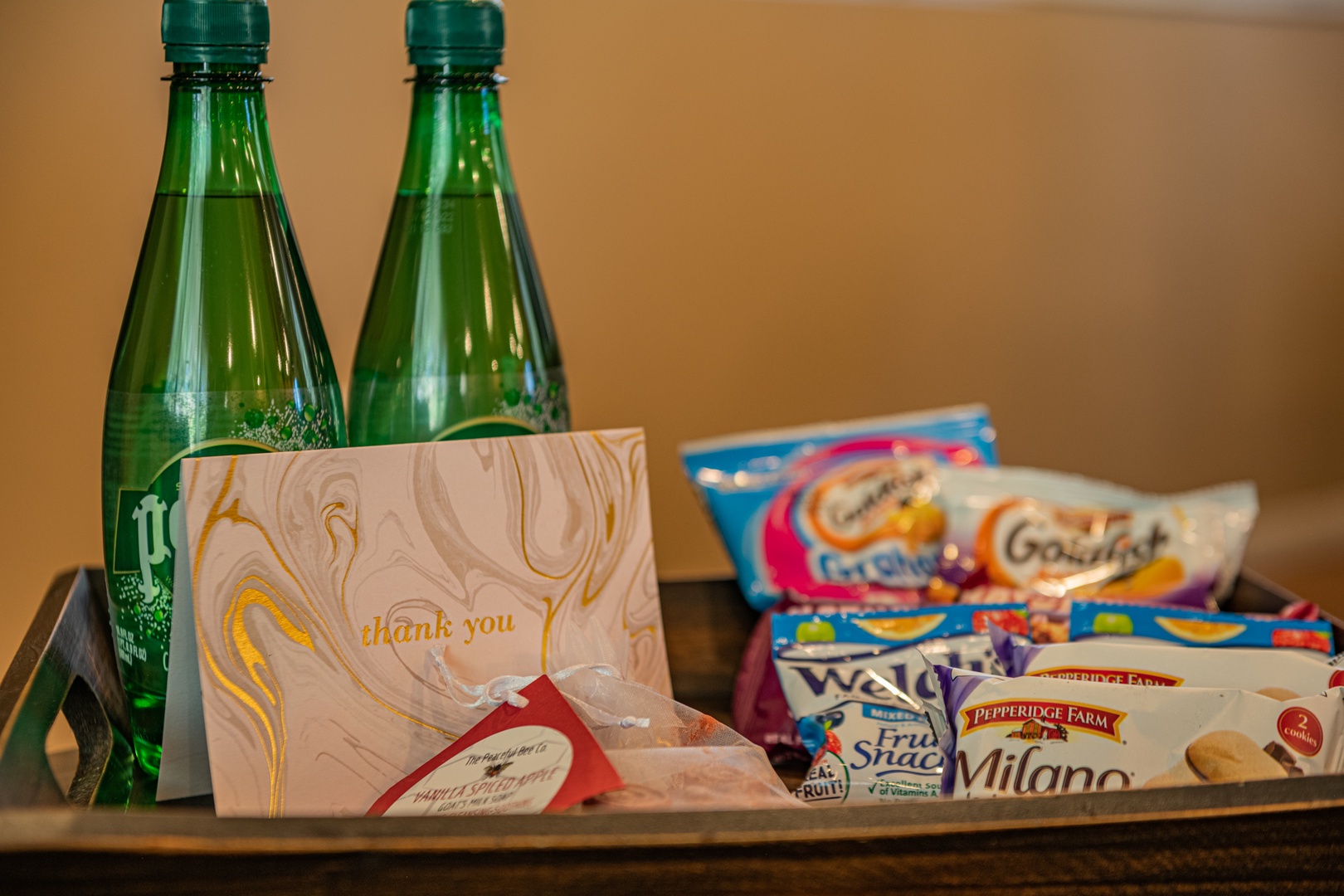Your host has prepared a thoughtful welcome basket with sparkling water, snacks, and cookies—perfectly placed to help you settle in and unwind.