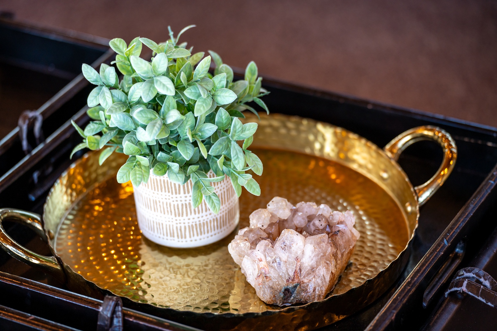 Relax with thoughtful touches—fresh greenery and natural crystals create a serene ambiance in your peaceful retreat.