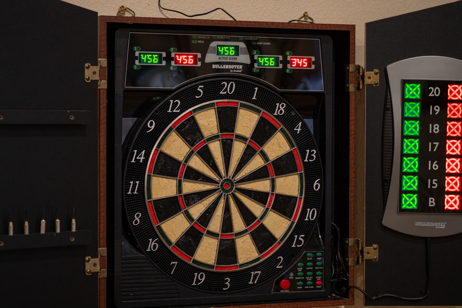 Test your skills and enjoy some friendly competition with this electronic dartboard setup, complete with automatic scoring and multiplayer tracking.