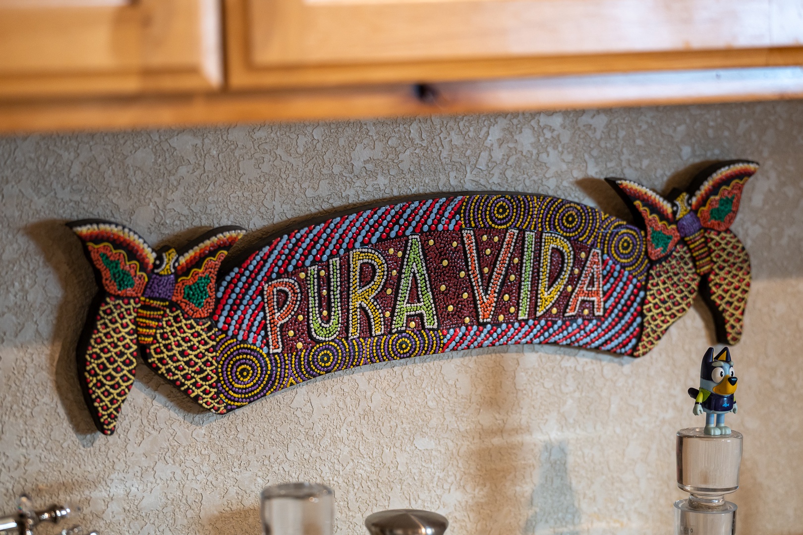 Your kitchen features authentic Costa Rican artwork that adds vibrant character and local charm to your cooking space.