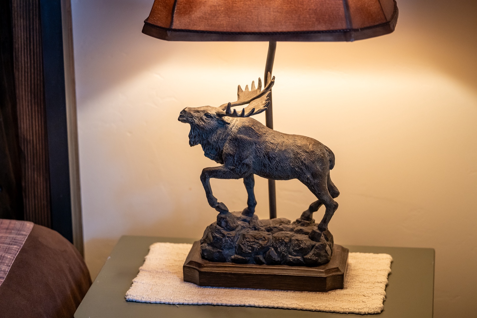 You'll love the rustic charm of this handcrafted moose lamp, adding cozy mountain lodge character to your stay.