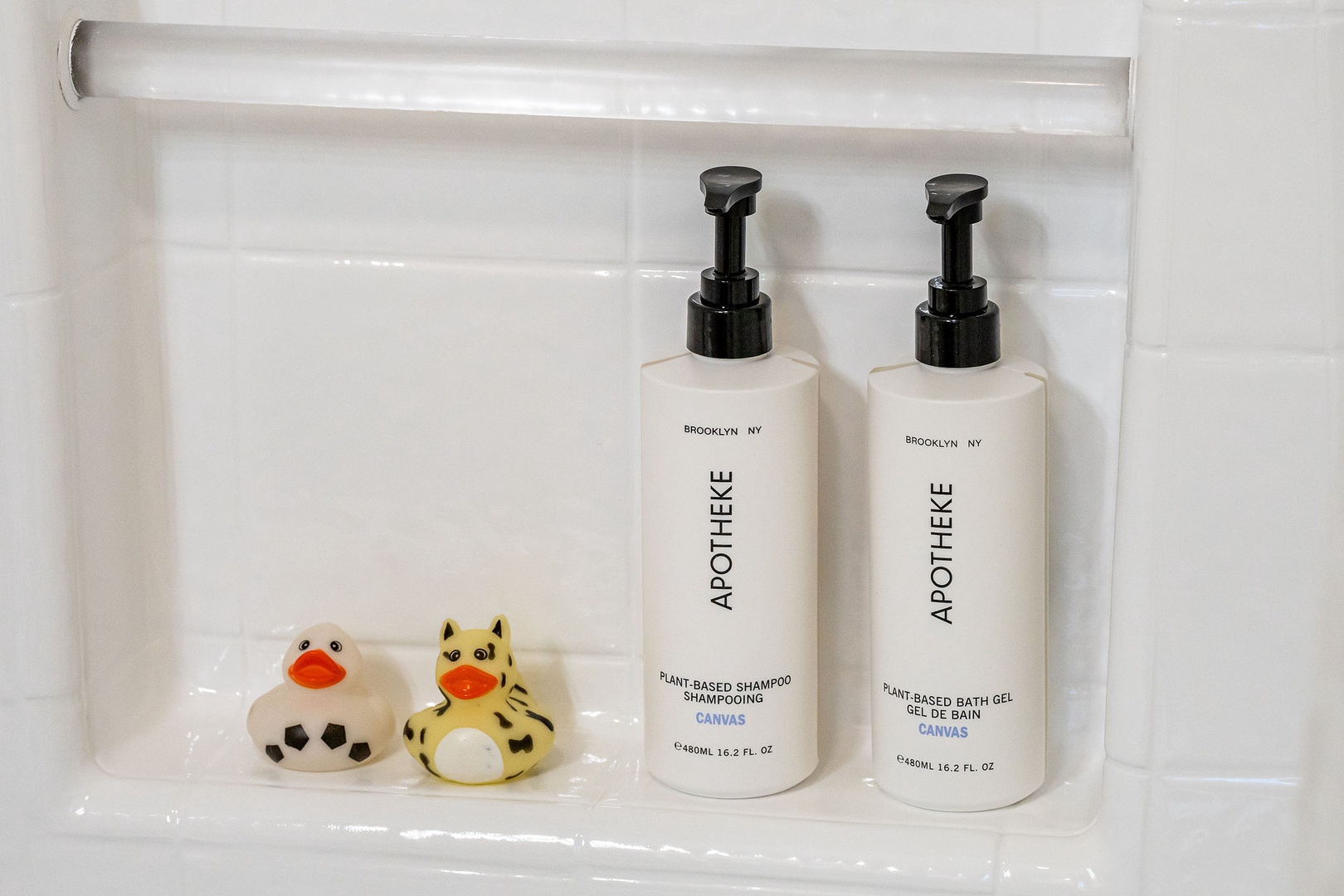 Charming bath details await with quality toiletries and playful rubber ducks to brighten your daily routine.