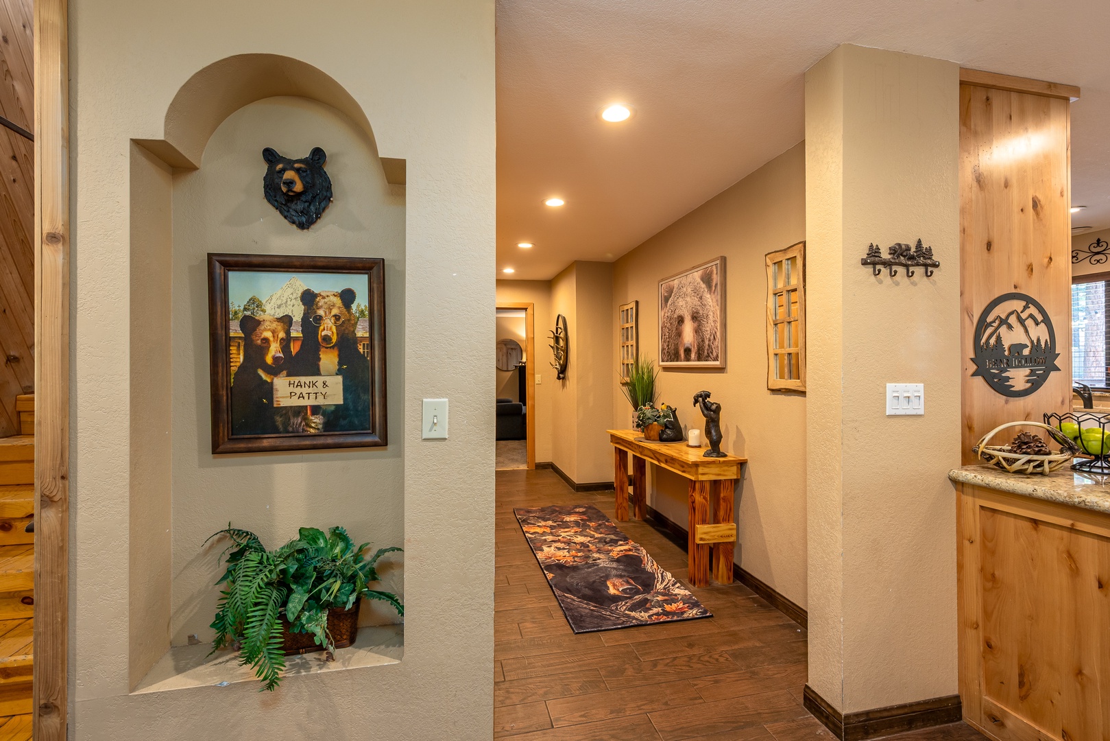 Step into your cozy mountain getaway where rustic charm meets warm hospitality. Natural wood accents and bear-themed décor create an inviting atmosphere that'll make you feel right at home from the moment you arrive.