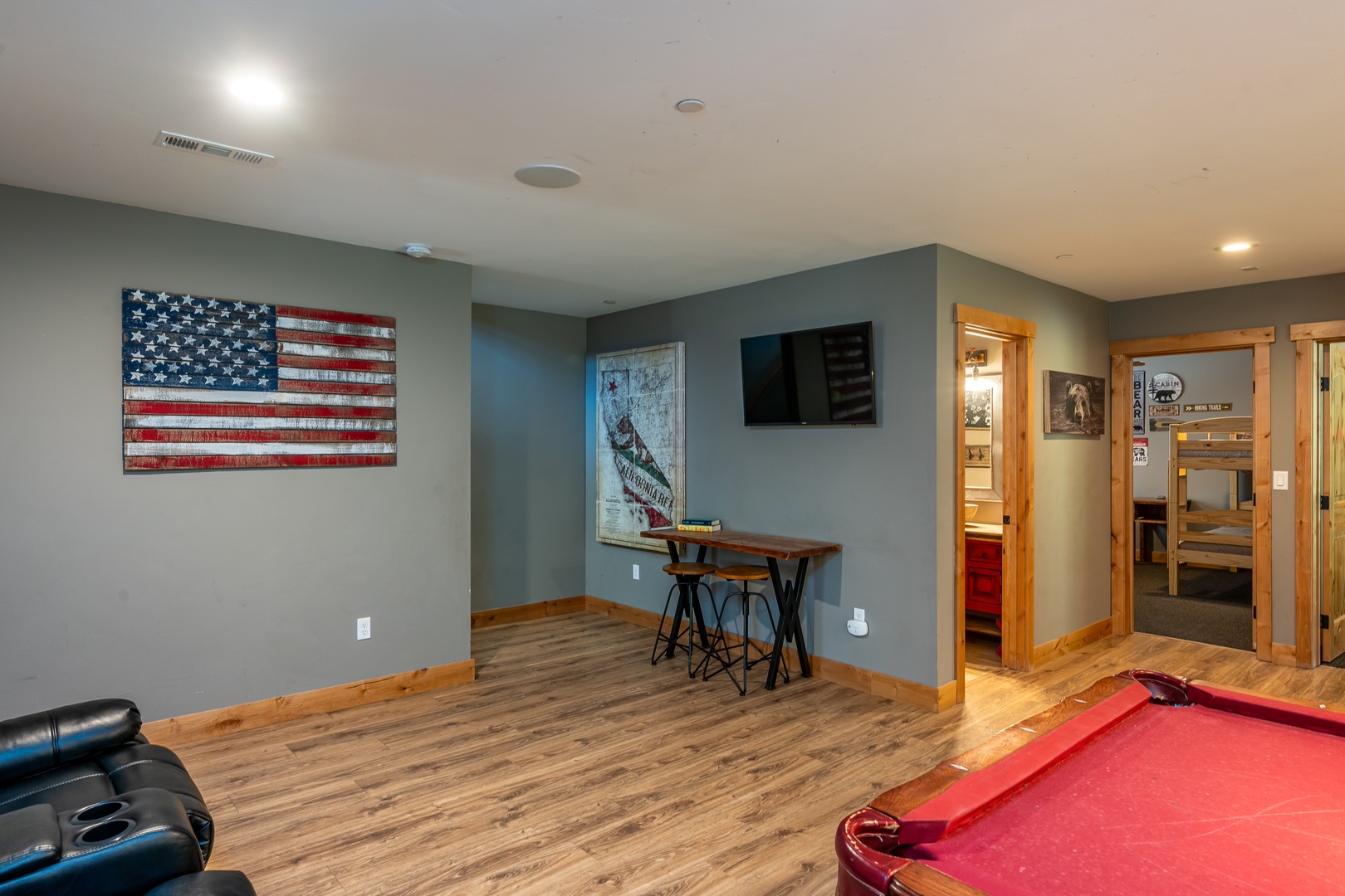 Your own game room awaits, complete with billiards, comfy seating, and warm wood accents—perfect for friendly competition or relaxed evenings indoors.