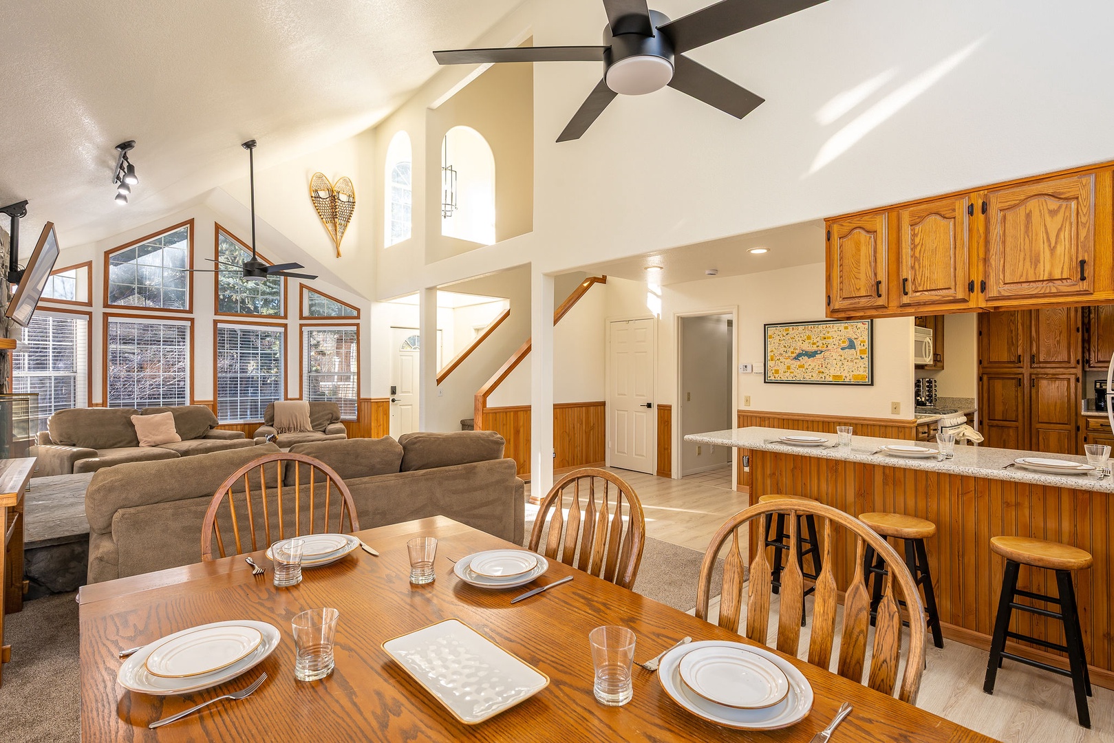 Whether gathered around the dining table or hanging out in the living room, create great memories in this bright and light open-concept space.