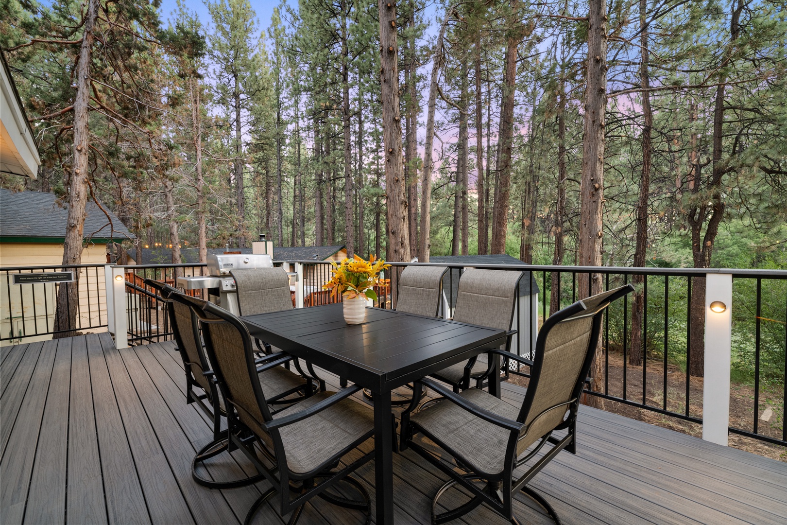 Enjoy morning coffee or evening meals at your private outdoor dining space, surrounded by towering pines and fresh mountain air. The perfect setting for memorable gatherings.