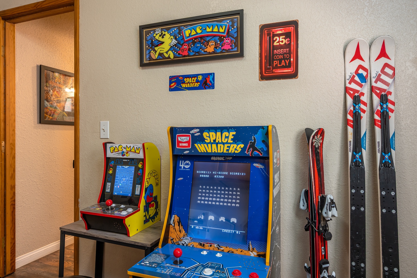 Challenge your friends to a retro arcade showdown with classic Pac-Man and Space Invaders consoles, then gear up for mountain adventures with your own skis right here.