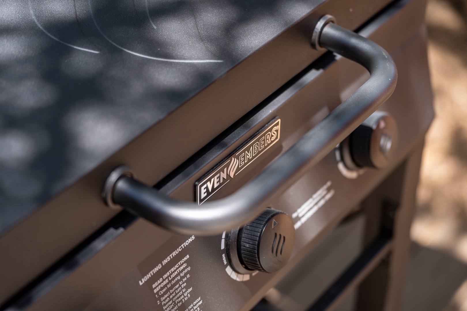 A gas grill ready for your outdoor cooking adventures, featuring durable handles and precise temperature control for memorable meals.