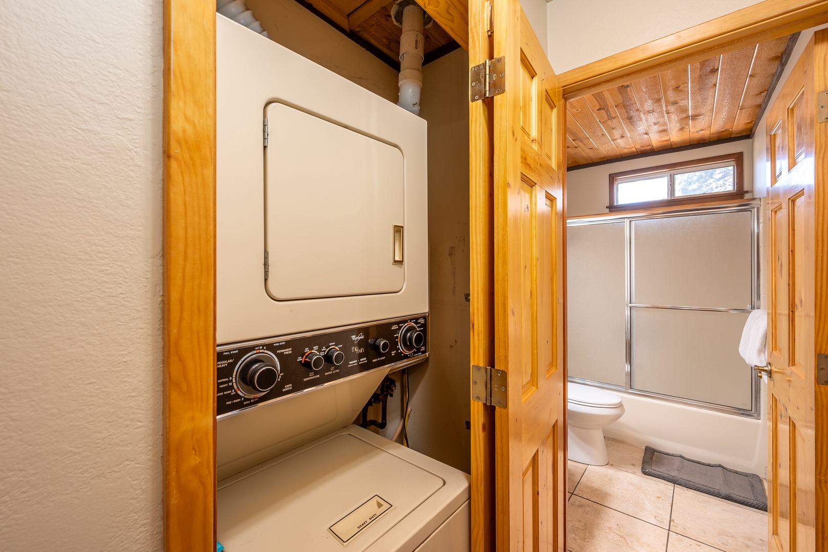 Your private laundry nook makes extended stays effortless, with washer and dryer tucked beside your full bathroom.