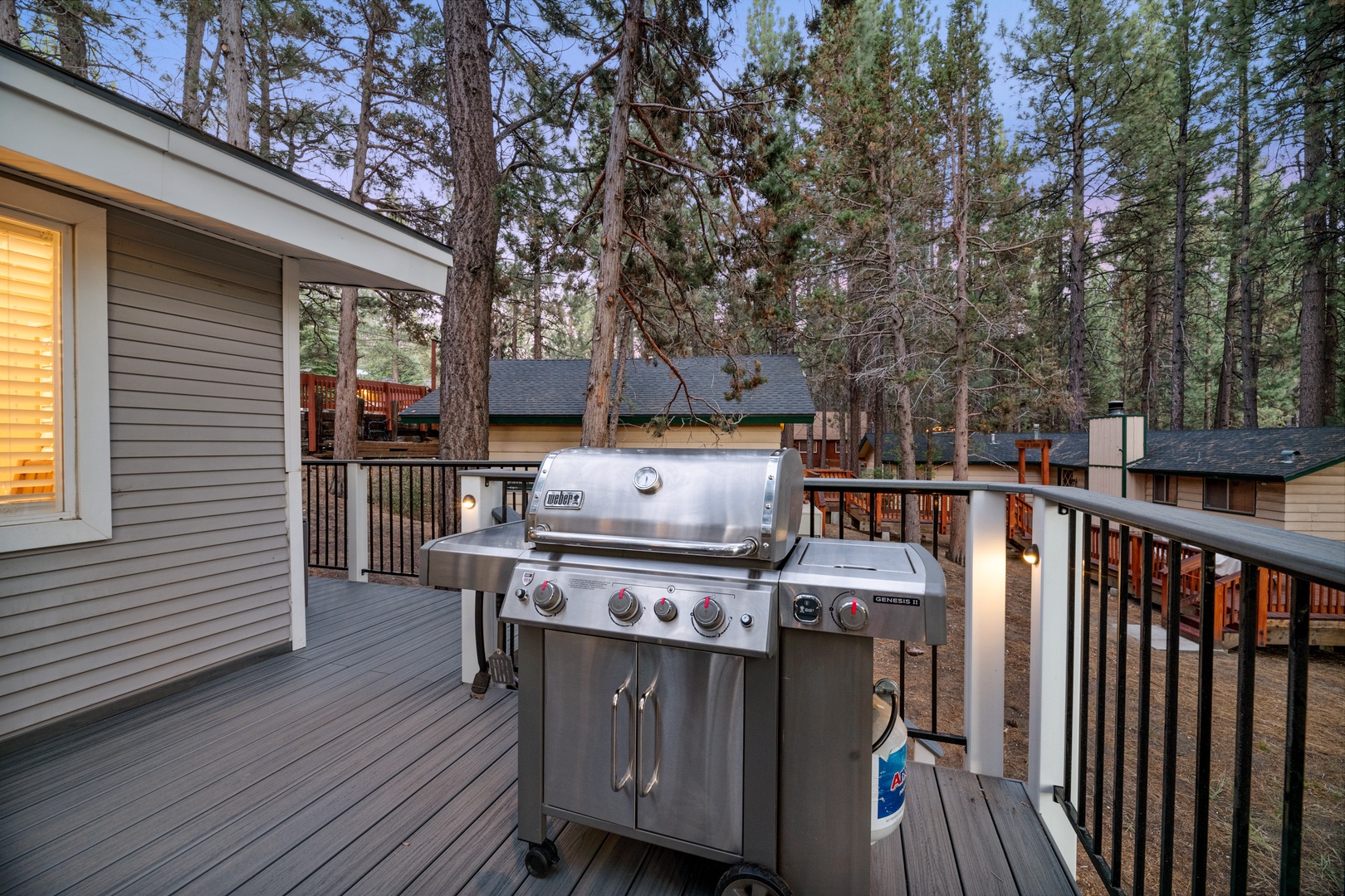 Fire up the grill on your private deck and savor mountain air as you cook dinner surrounded by towering pines and peaceful forest views.
