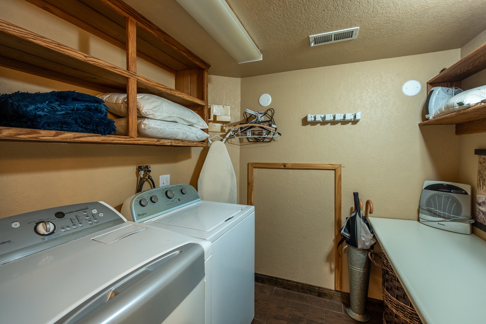 Your own in-unit laundry room with washer and dryer means packing light and staying fresh. Clever storage shelves keep your essentials organized throughout your stay.